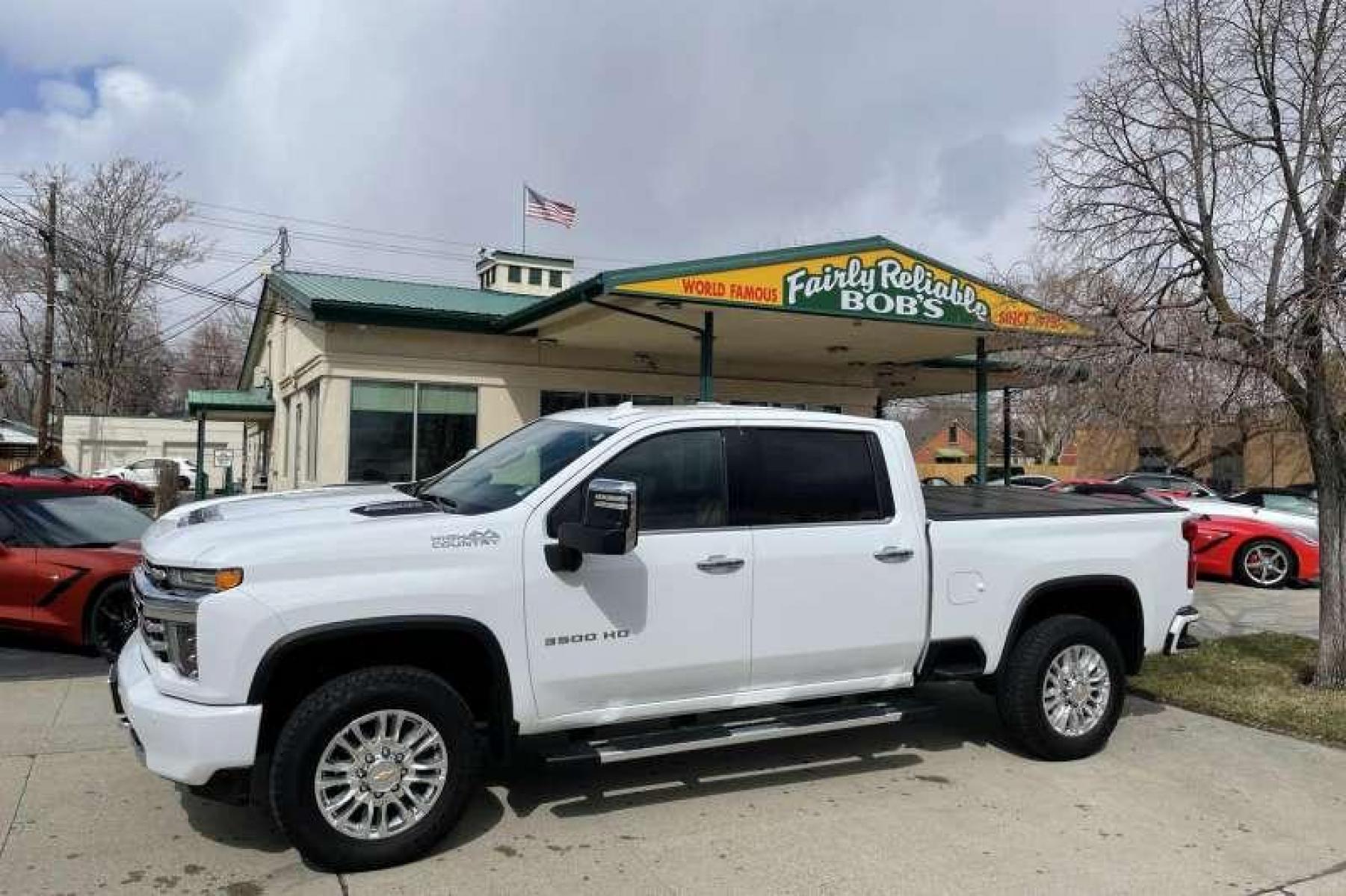 2022 Summit White /Jet Black/Umber Chevrolet Silverado 3500HD Crew Cab High Country (1GC4YVEY2NF) with an V8 6.6 Liter Turbo Diesel engine, Automatic transmission, located at 2304 W. Main St., Boise, ID, 83702, (208) 342-7777, 43.622105, -116.218658 - Financing Available O.A.C. - Photo #0