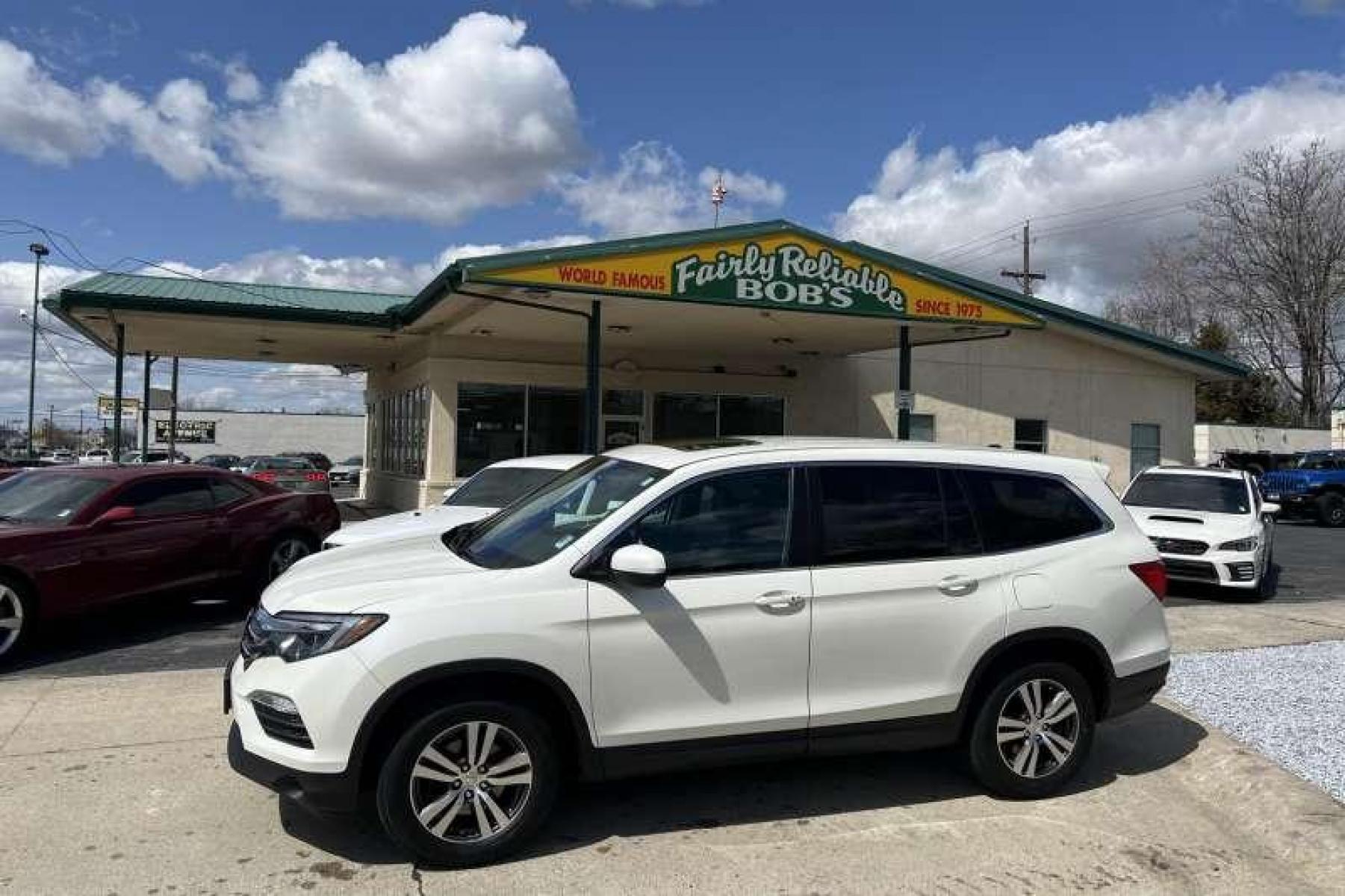 2017 White Diamond Pearl /Black Honda Pilot EX-L (5FNYF6H53HB) with an V6 3.5 Liter engine, Automatic transmission, located at 2304 W. Main St., Boise, ID, 83702, (208) 342-7777, 43.622105, -116.218658 - Local Boise Dealership! Ready to Go! - Photo #0