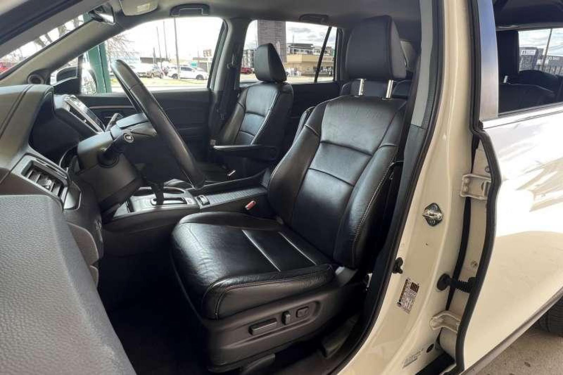 2017 White Diamond Pearl /Black Honda Pilot EX-L (5FNYF6H53HB) with an V6 3.5 Liter engine, Automatic transmission, located at 2304 W. Main St., Boise, ID, 83702, (208) 342-7777, 43.622105, -116.218658 - Local Boise Dealership! Ready to Go! - Photo #5