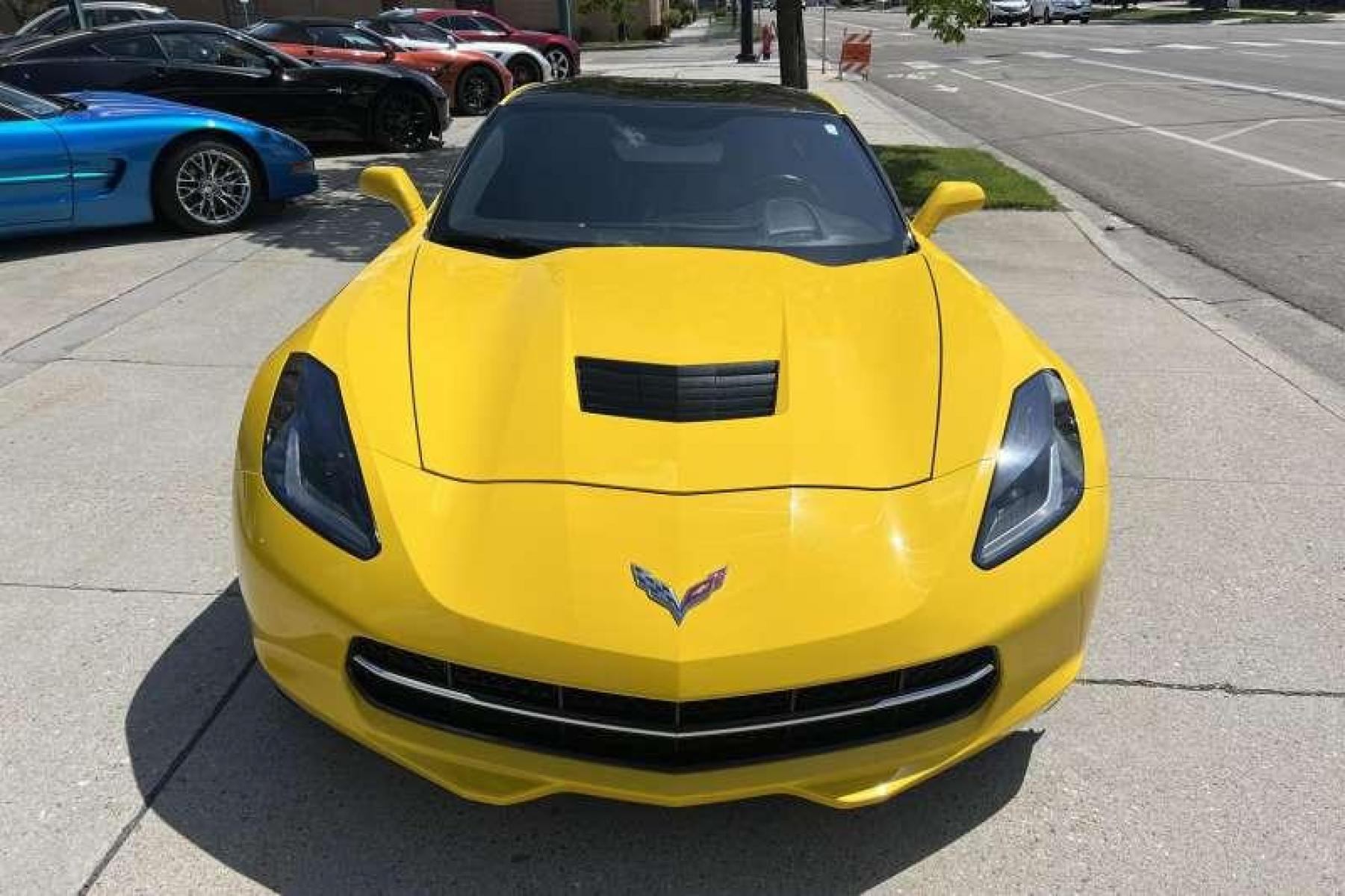 2015 Velocity Yellow /Black Chevrolet Corvette Stingray 3LT Z51 Coupe (1G1YM2D73F5) with an V8 6.2 Liter engine, Automatic transmission, located at 2304 W. Main St., Boise, ID, 83702, (208) 342-7777, 43.622105, -116.218658 - Photo #1