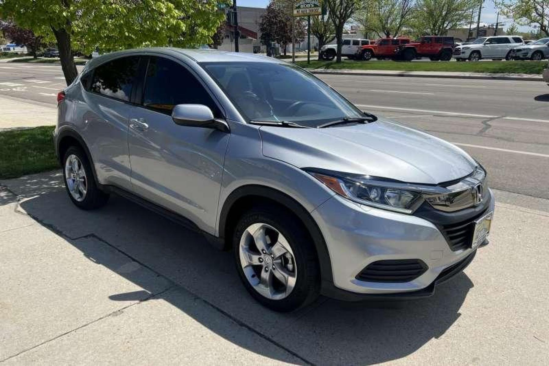 2022 Lunar Silver Metallic /Black/Gray Honda HR-V LX (3CZRU6H35NM) with an 4 Cyl 1.8 Liter engine, Automatic transmission, located at 2304 W. Main St., Boise, ID, 83702, (208) 342-7777, 43.622105, -116.218658 - Financing Available O.A.C. - Photo #2
