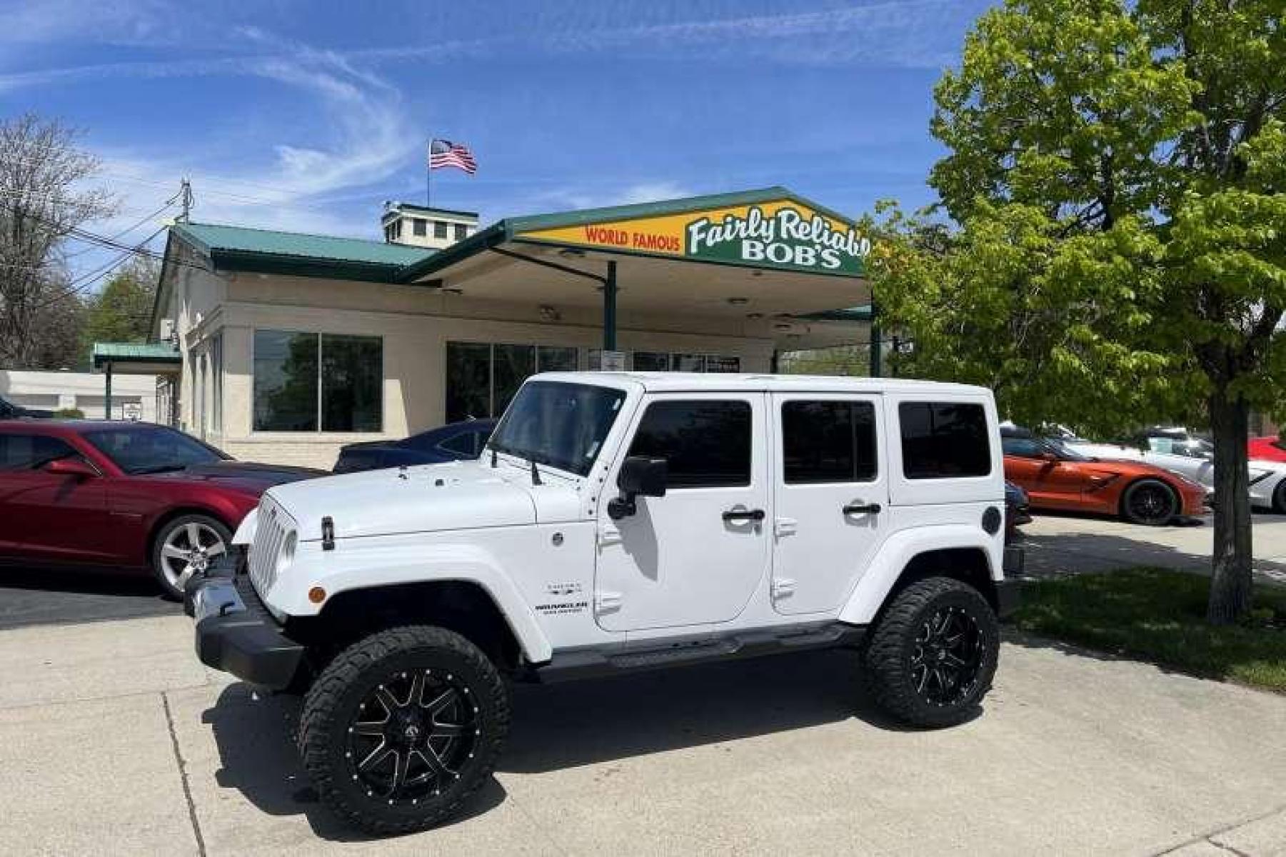 2017 Bright White /Black Jeep Wrangler Unlimited Sahara (1C4BJWEG7HL) with an V6 3.6 Liter engine, Automatic transmission, located at 2304 W. Main St., Boise, ID, 83702, (208) 342-7777, 43.622105, -116.218658 - Ready for adventure! - Photo #0