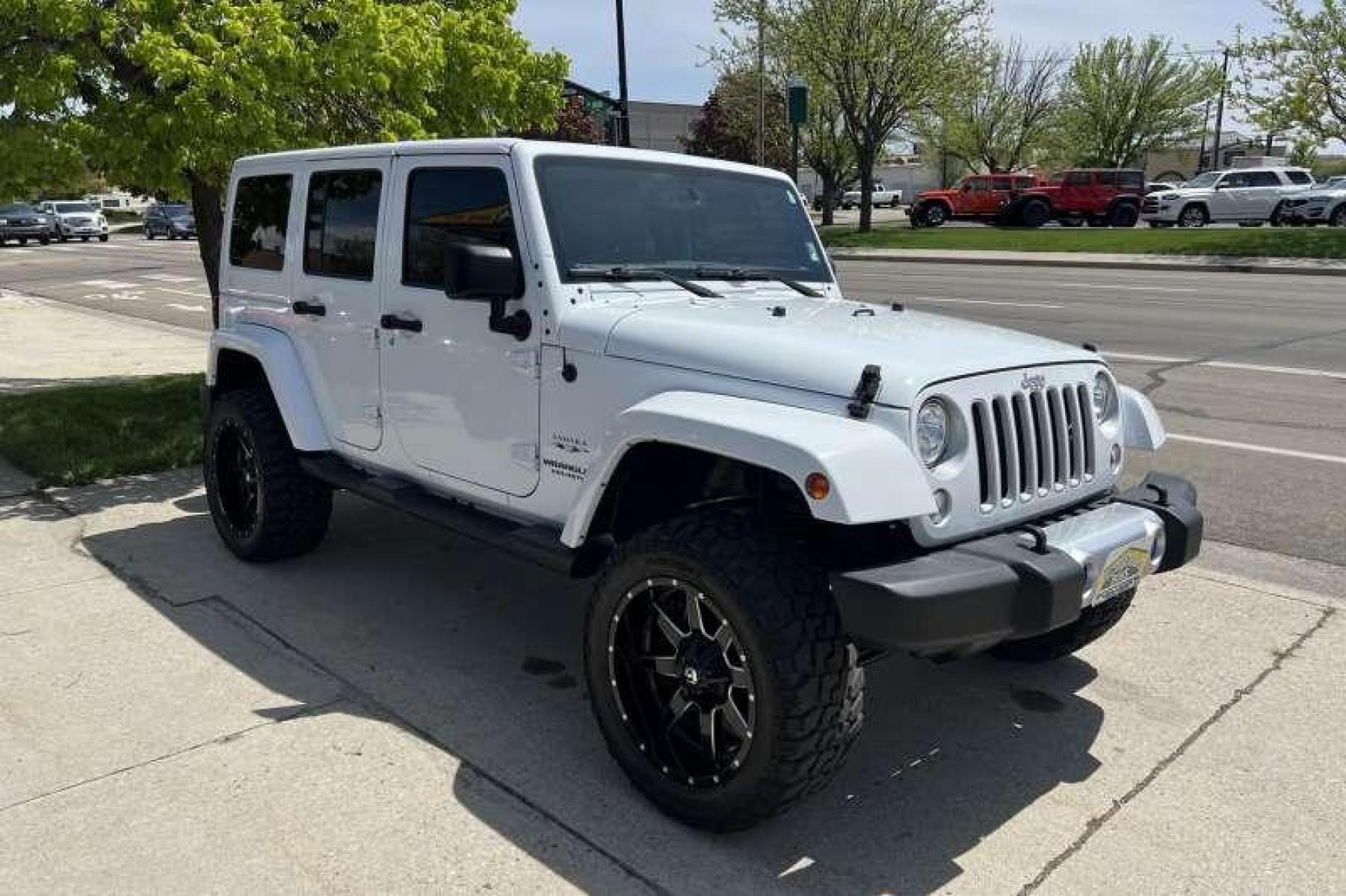 2017 Bright White /Black Jeep Wrangler Unlimited Sahara (1C4BJWEG7HL) with an V6 3.6 Liter engine, Automatic transmission, located at 2304 W. Main St., Boise, ID, 83702, (208) 342-7777, 43.622105, -116.218658 - Ready for adventure! - Photo #2