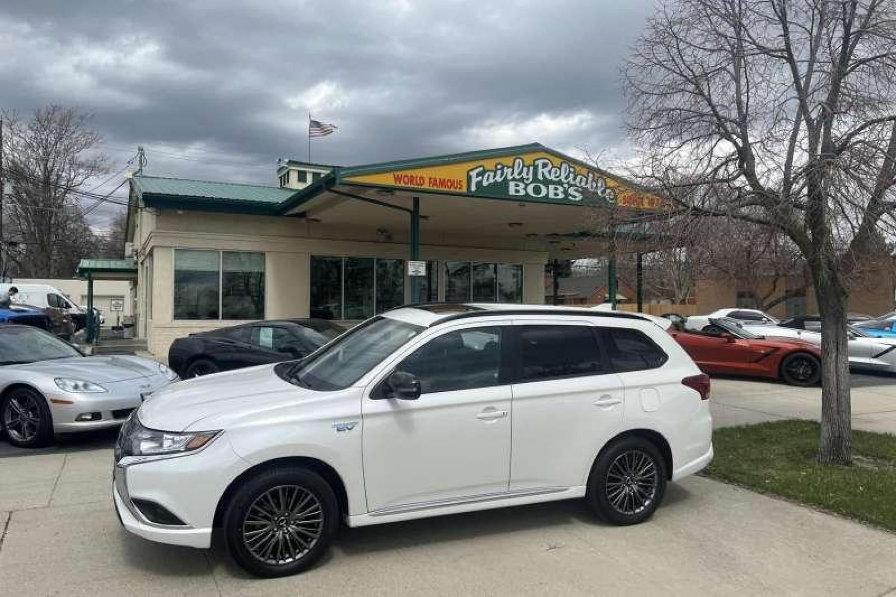 2021 White Diamond Pearl /Black Mitsubishi Outlander PHEV LE (JA4J2VA76MZ) with an 4 Cyl 2.4 Liter Hybrid engine, Automatic transmission, located at 2304 W. Main St., Boise, ID, 83702, (208) 342-7777, 43.622105, -116.218658 - Financing Available O.A.C. - Photo #0