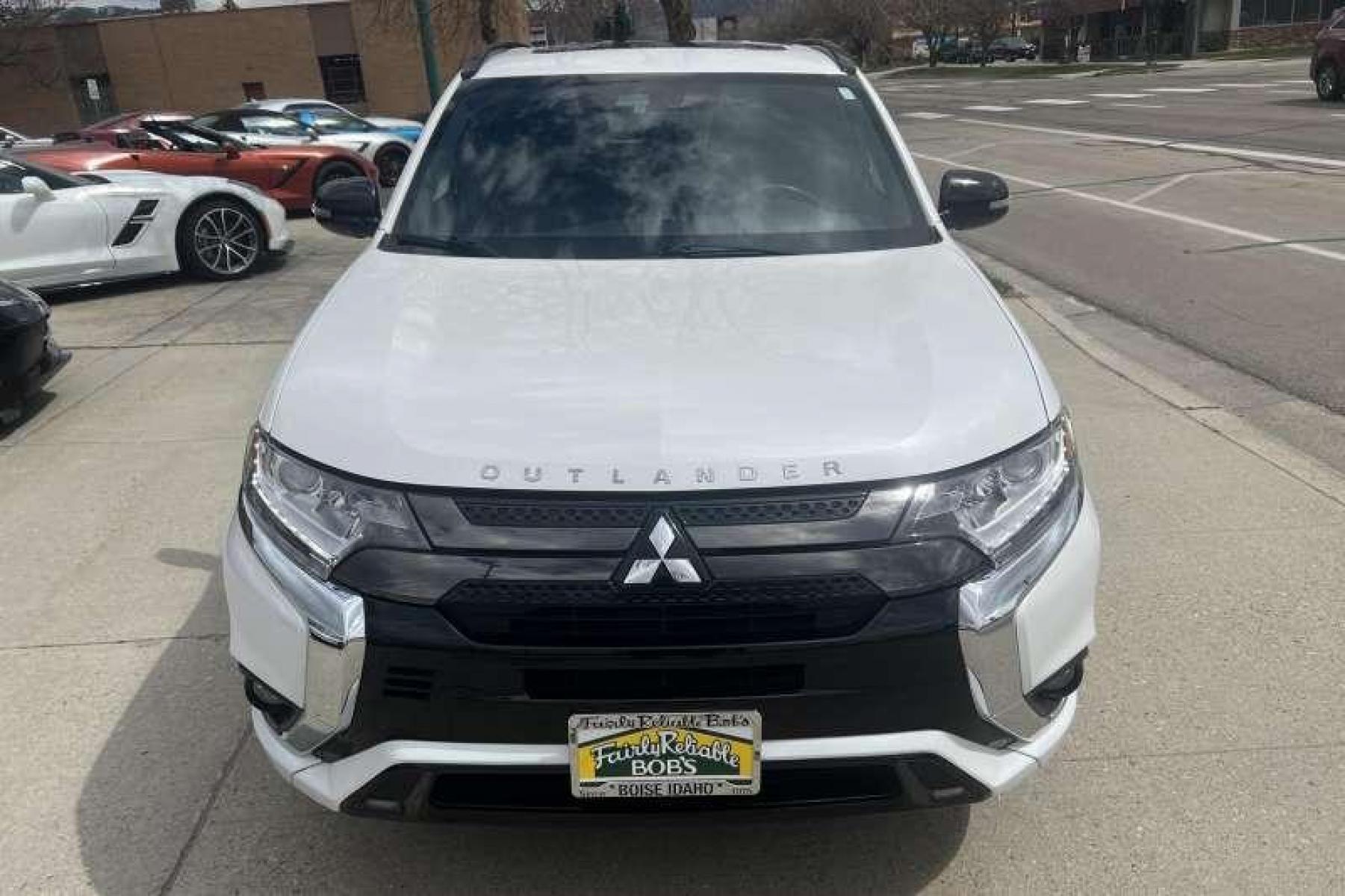 2021 White Diamond Pearl /Black Mitsubishi Outlander PHEV LE (JA4J2VA76MZ) with an 4 Cyl 2.4 Liter Hybrid engine, Automatic transmission, located at 2304 W. Main St., Boise, ID, 83702, (208) 342-7777, 43.622105, -116.218658 - Financing Available O.A.C. - Photo #1