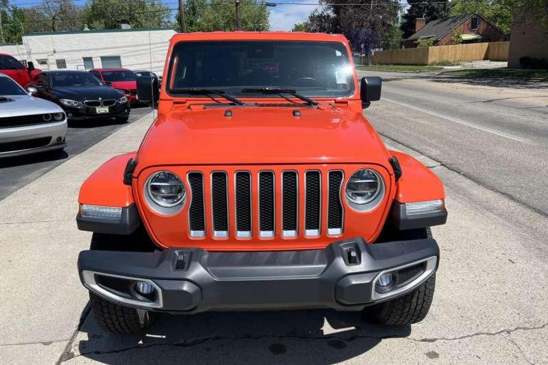 2019 Punkn Metallic Orange /Black Jeep Wrangler Unlimited Sahara (1C4HJXEG8KW) with an V6 3.6 Liter engine, Automatic transmission, located at 2304 W. Main St., Boise, ID, 83702, (208) 342-7777, 43.622105, -116.218658 - Great color! Low miles! - Photo #1