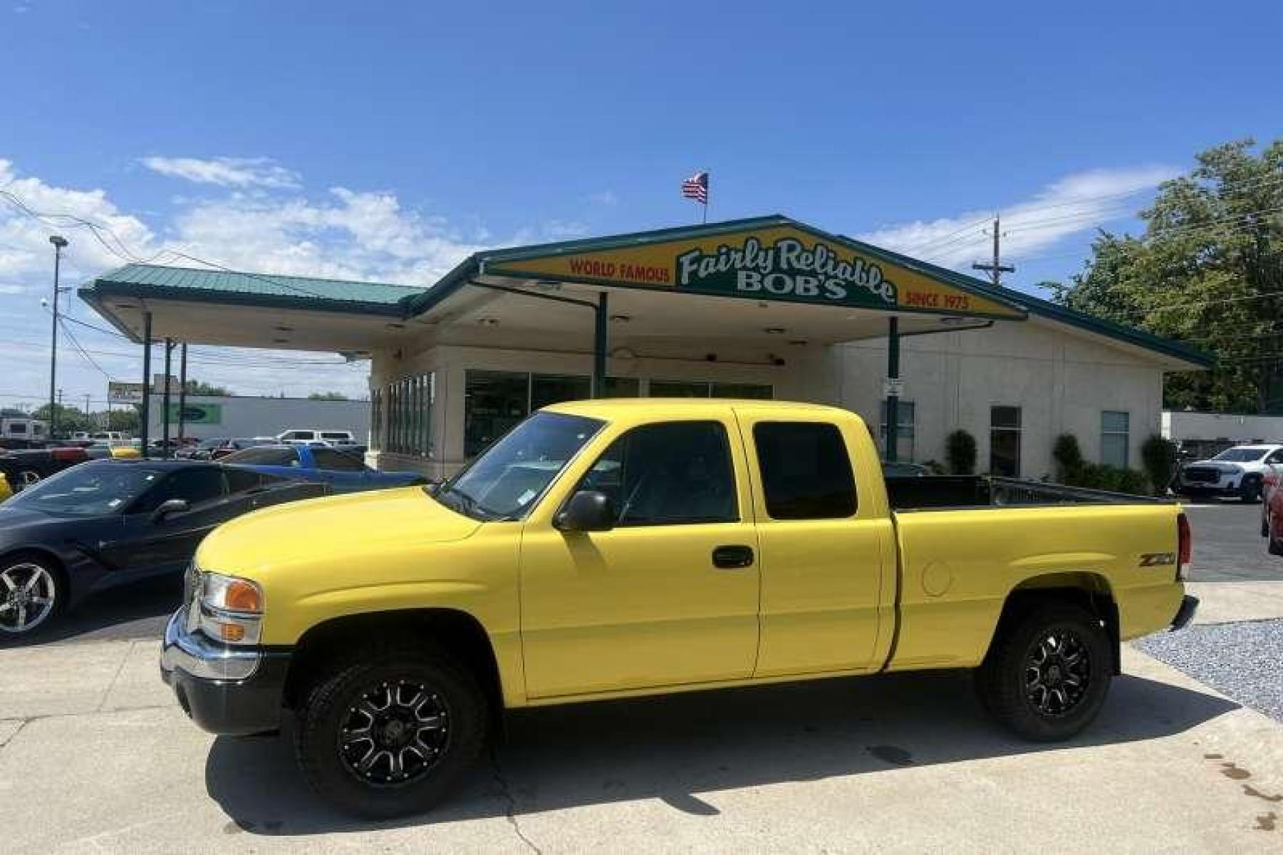 2003 Yellow /Black GMC Sierra 1500 Extended Cab SLE (1GTEK19T53Z) with an V8 5.3 Liter engine, Automatic transmission, located at 2304 W. Main St., Boise, ID, 83702, (208) 342-7777, 43.622105, -116.218658 - Financing Available O.A.C. - Photo #0