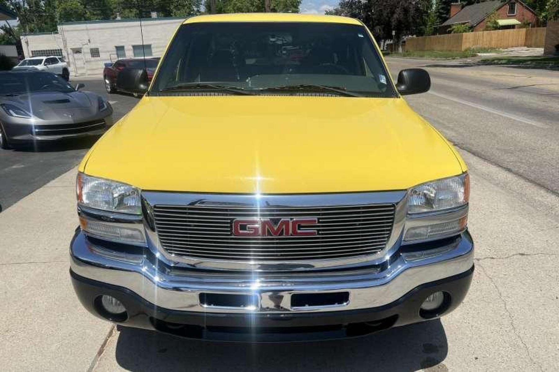 2003 Yellow /Black GMC Sierra 1500 Extended Cab SLE (1GTEK19T53Z) with an V8 5.3 Liter engine, Automatic transmission, located at 2304 W. Main St., Boise, ID, 83702, (208) 342-7777, 43.622105, -116.218658 - Financing Available O.A.C. - Photo #1