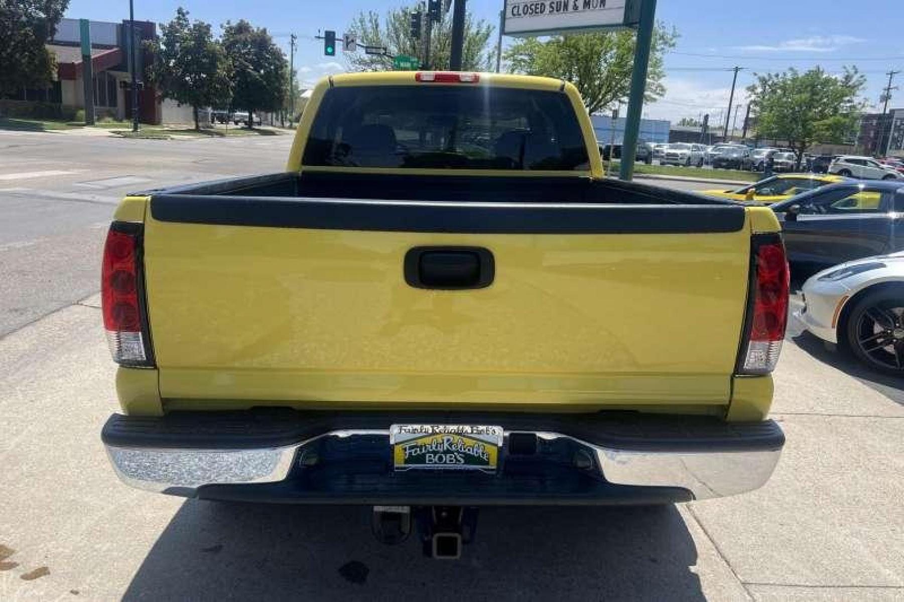 2003 Yellow /Black GMC Sierra 1500 Extended Cab SLE (1GTEK19T53Z) with an V8 5.3 Liter engine, Automatic transmission, located at 2304 W. Main St., Boise, ID, 83702, (208) 342-7777, 43.622105, -116.218658 - Financing Available O.A.C. - Photo #3