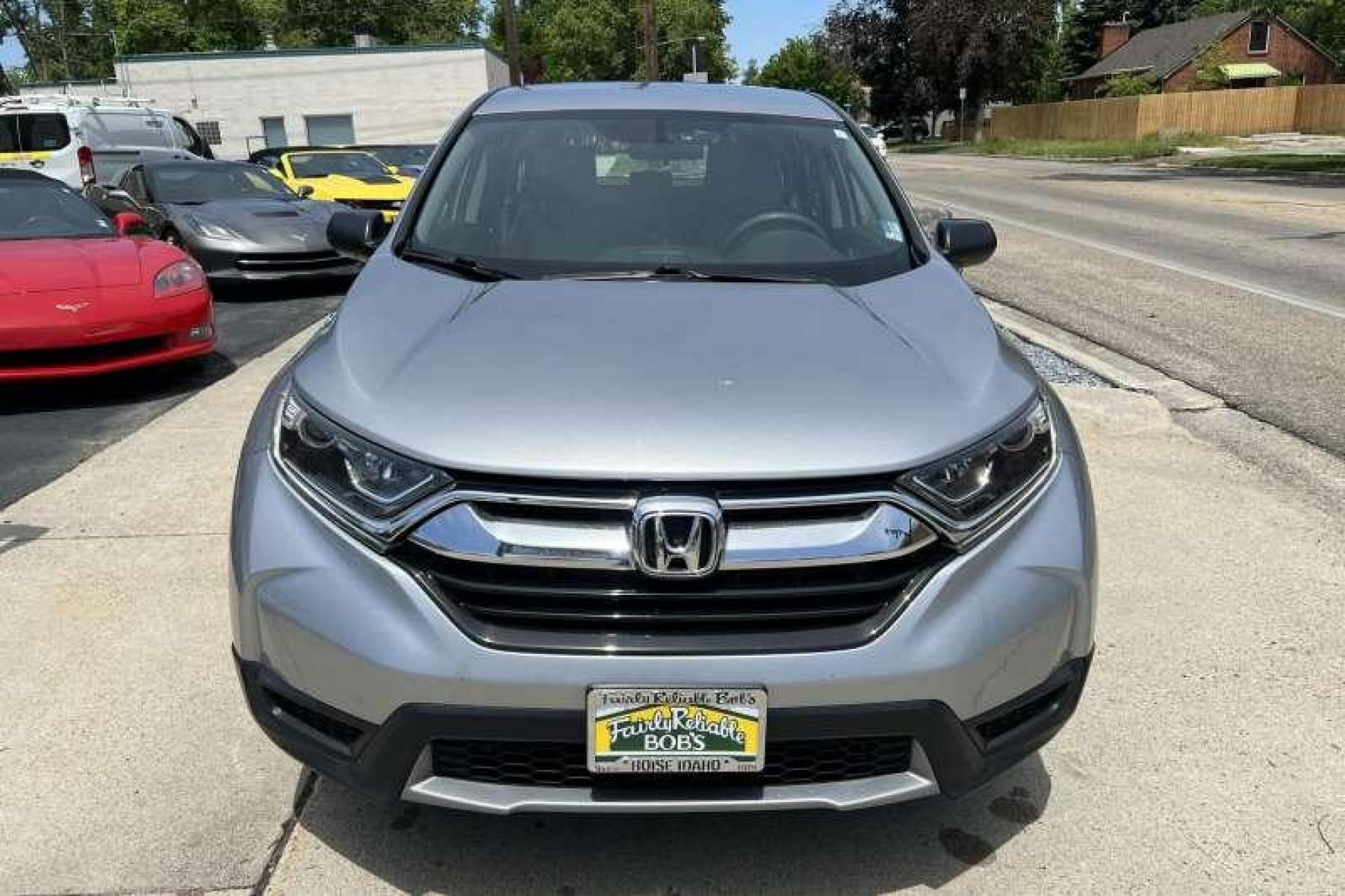 2018 Lunar Silver Metallic /Gray Honda CR-V LX (2HKRW6H3XJH) with an 4 Cyl 2.4 Liter engine, Automatic transmission, located at 2304 W. Main St., Boise, ID, 83702, (208) 342-7777, 43.622105, -116.218658 - All Wheel Drive! New Tires! - Photo #1