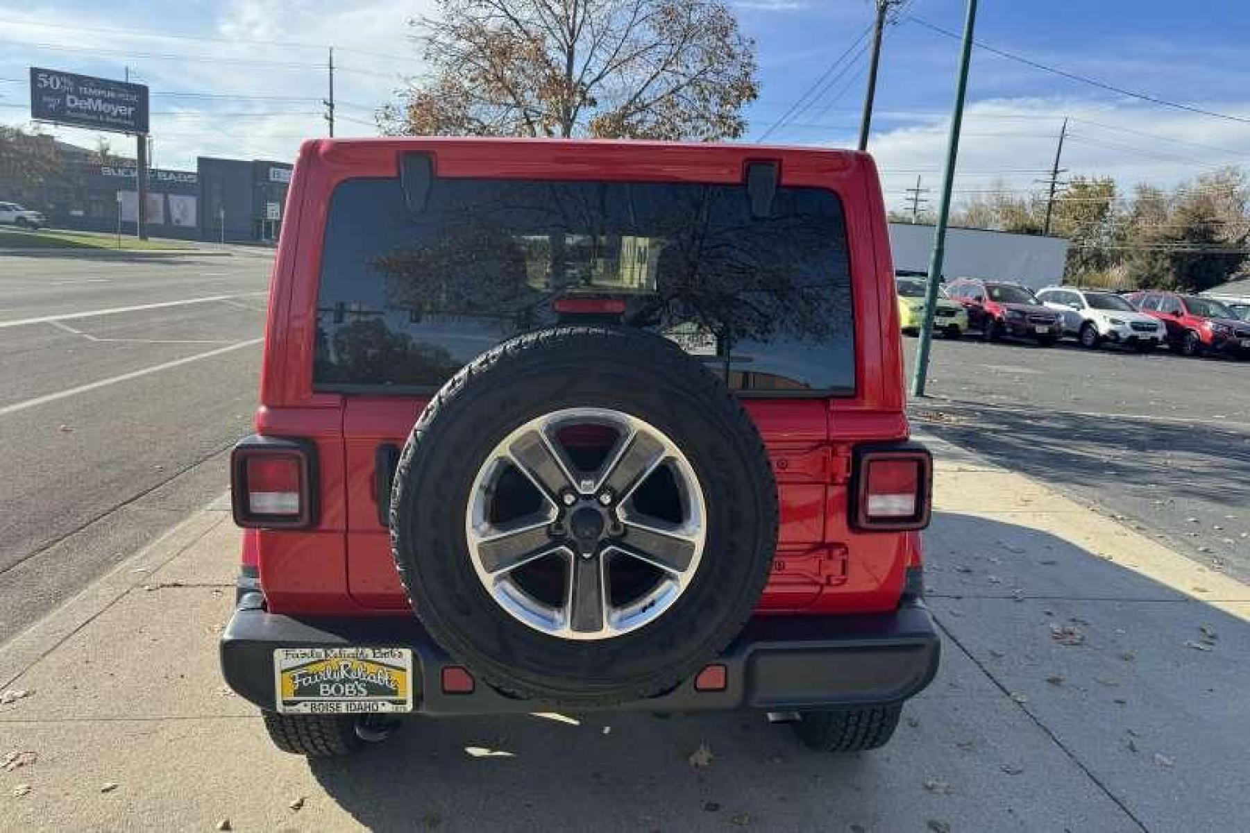 2021 Red /Black Jeep Wrangler Unlimited Sahara (1C4HJXEN1MW) with an 4 Cyl 2.0 Liter Turbo engine, Automatic transmission, located at 2304 W. Main St., Boise, ID, 83702, (208) 342-7777, 43.622105, -116.218658 - Photo #1
