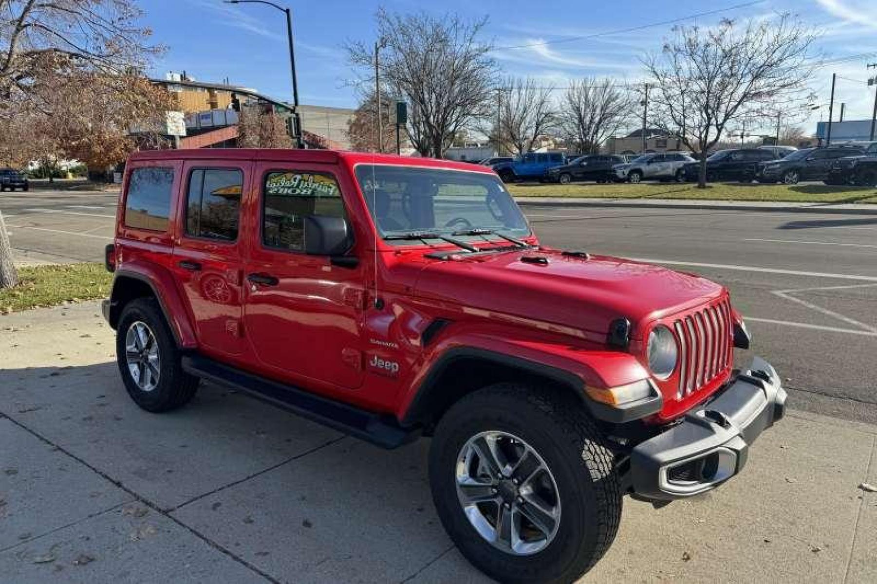 2021 Red /Black Jeep Wrangler Unlimited Sahara (1C4HJXEN1MW) with an 4 Cyl 2.0 Liter Turbo engine, Automatic transmission, located at 2304 W. Main St., Boise, ID, 83702, (208) 342-7777, 43.622105, -116.218658 - Photo #2