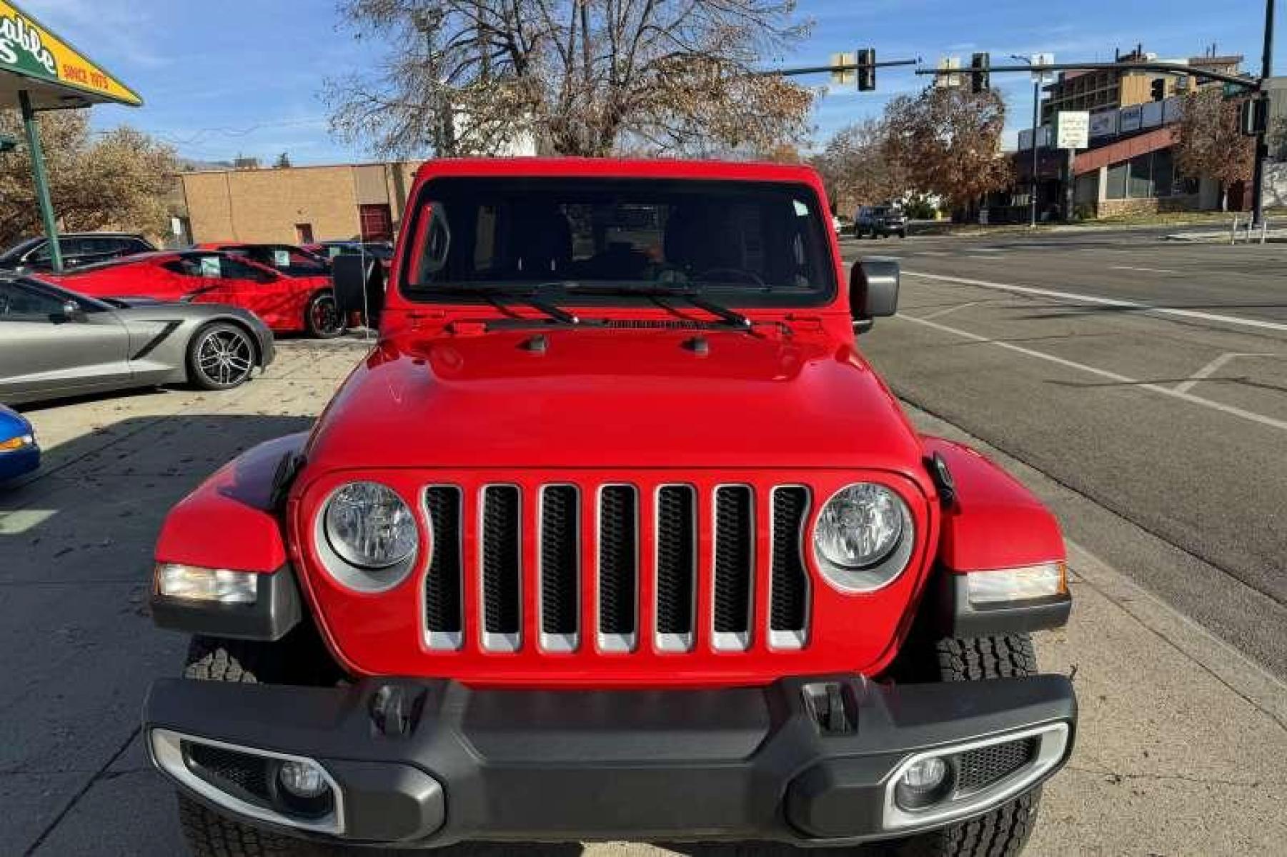 2021 Red /Black Jeep Wrangler Unlimited Sahara (1C4HJXEN1MW) with an 4 Cyl 2.0 Liter Turbo engine, Automatic transmission, located at 2304 W. Main St., Boise, ID, 83702, (208) 342-7777, 43.622105, -116.218658 - Photo #3