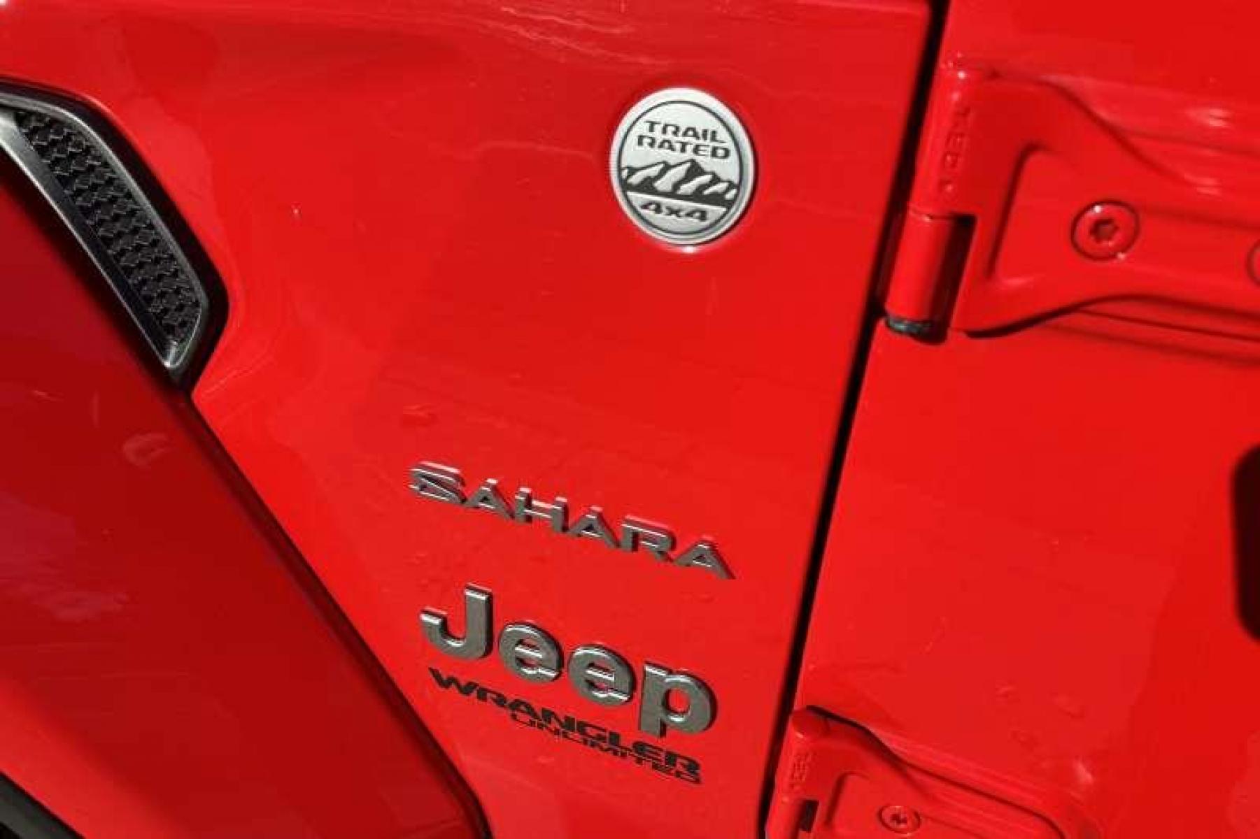 2021 Red /Black Jeep Wrangler Unlimited Sahara (1C4HJXEN1MW) with an 4 Cyl 2.0 Liter Turbo engine, Automatic transmission, located at 2304 W. Main St., Boise, ID, 83702, (208) 342-7777, 43.622105, -116.218658 - Photo #4