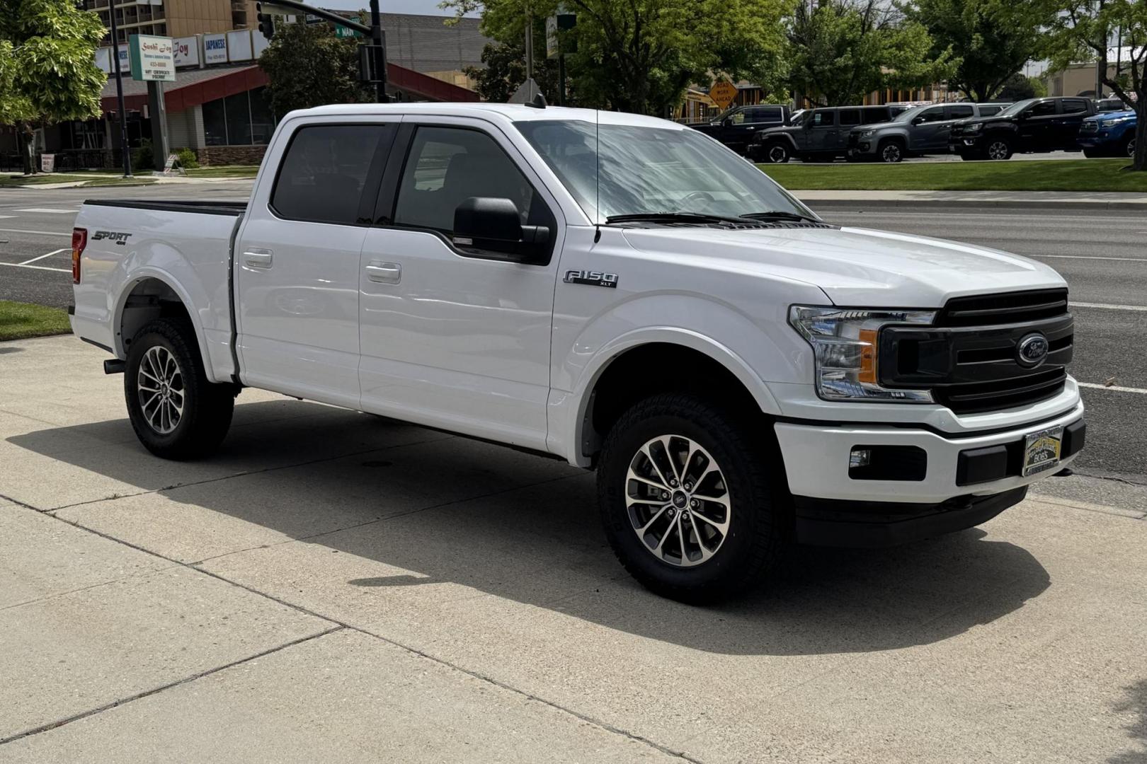 2019 Oxford White /Black Ford F-150 Super Crew XLT Sport (1FTEW1E4XKK) with an V6 3.5 Liter Twin-Turbo engine, Automatic 10 Speed transmission, located at 2304 W. Main St., Boise, ID, 83702, (208) 342-7777, 43.622105, -116.218658 - New Tires! Nicely Optioned! - Photo#2
