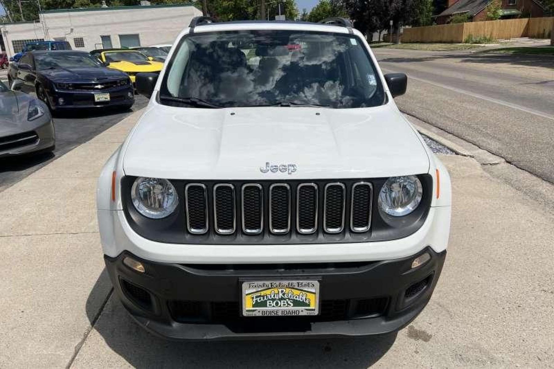 2015 White /Tan Jeep Renegade Sport (ZACCJBAT9FP) with an 4 Cyl 2.4 Liter engine, Automatic transmission, located at 2304 W. Main St., Boise, ID, 83702, (208) 342-7777, 43.622105, -116.218658 - Financing Available O.A.C. - Photo #1