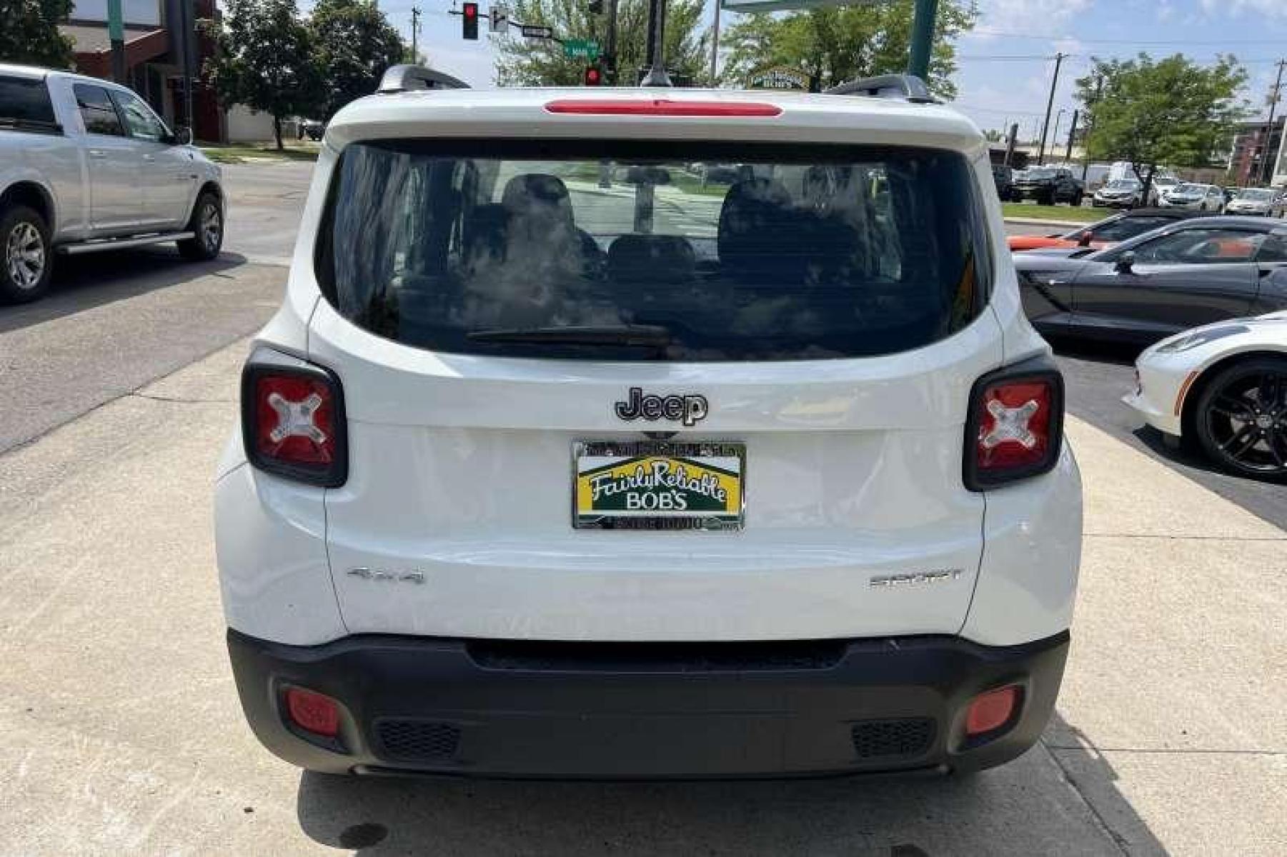 2015 White /Tan Jeep Renegade Sport (ZACCJBAT9FP) with an 4 Cyl 2.4 Liter engine, Automatic transmission, located at 2304 W. Main St., Boise, ID, 83702, (208) 342-7777, 43.622105, -116.218658 - Financing Available O.A.C. - Photo #3