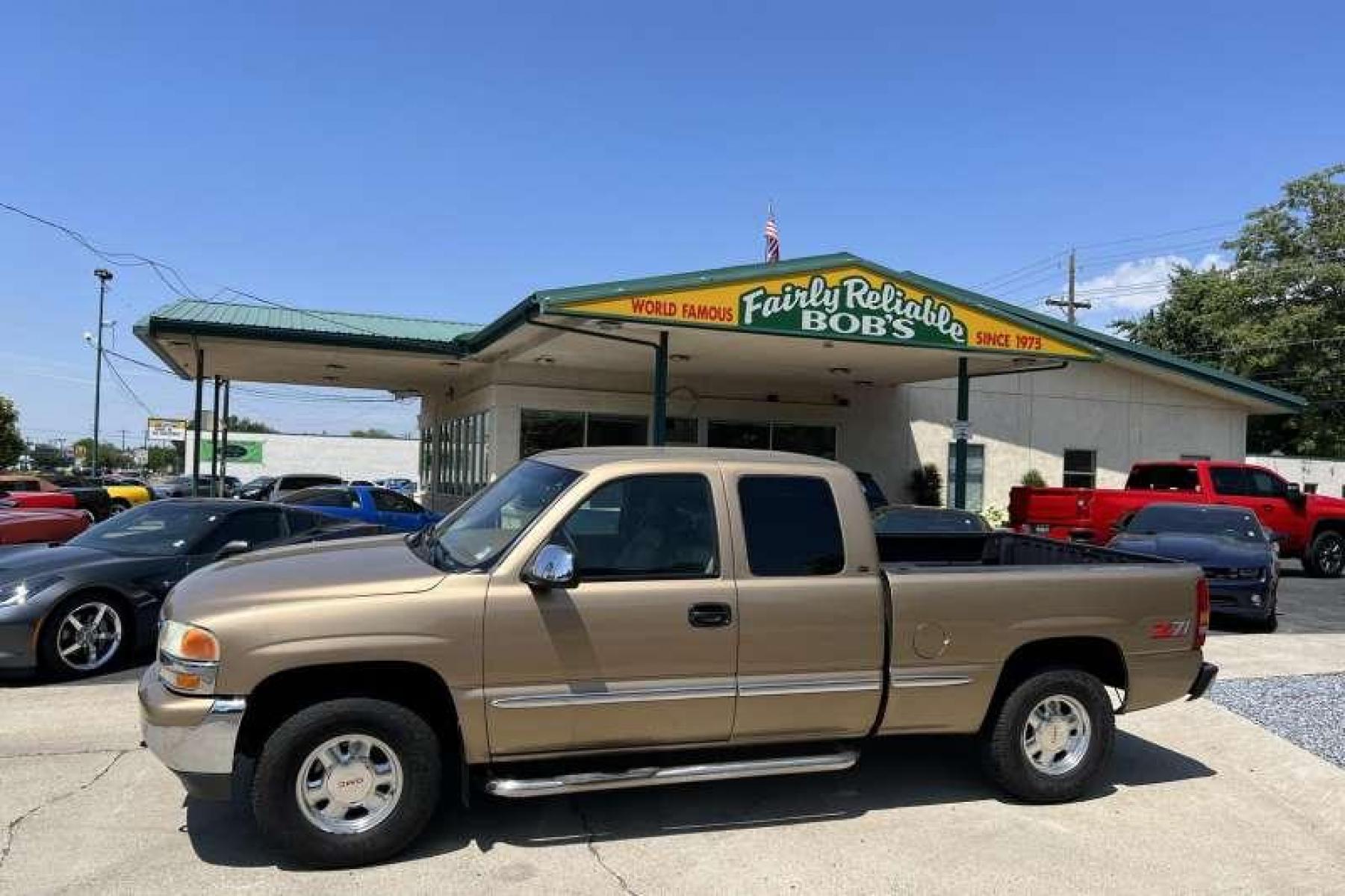 1999 Gold Metallic /Tan GMC Sierra 1500 Extended Cab Z71 (1GTEK19T6XZ) with an V8 5.3 Liter engine, Automatic transmission, located at 2304 W. Main St., Boise, ID, 83702, (208) 342-7777, 43.622105, -116.218658 - Must see in person! - Photo #0