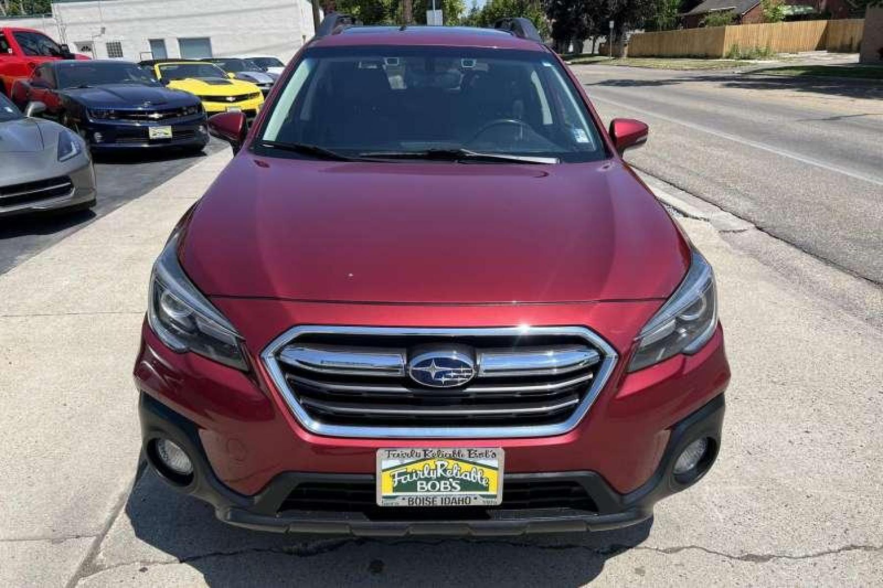 2018 Crimson Red Pearl /Black Subaru Outback Limited 3.6R (4S4BSENC9J3) with an H6 3.6 Liter engine, Automatic transmission, located at 2304 W. Main St., Boise, ID, 83702, (208) 342-7777, 43.622105, -116.218658 - Photo #1