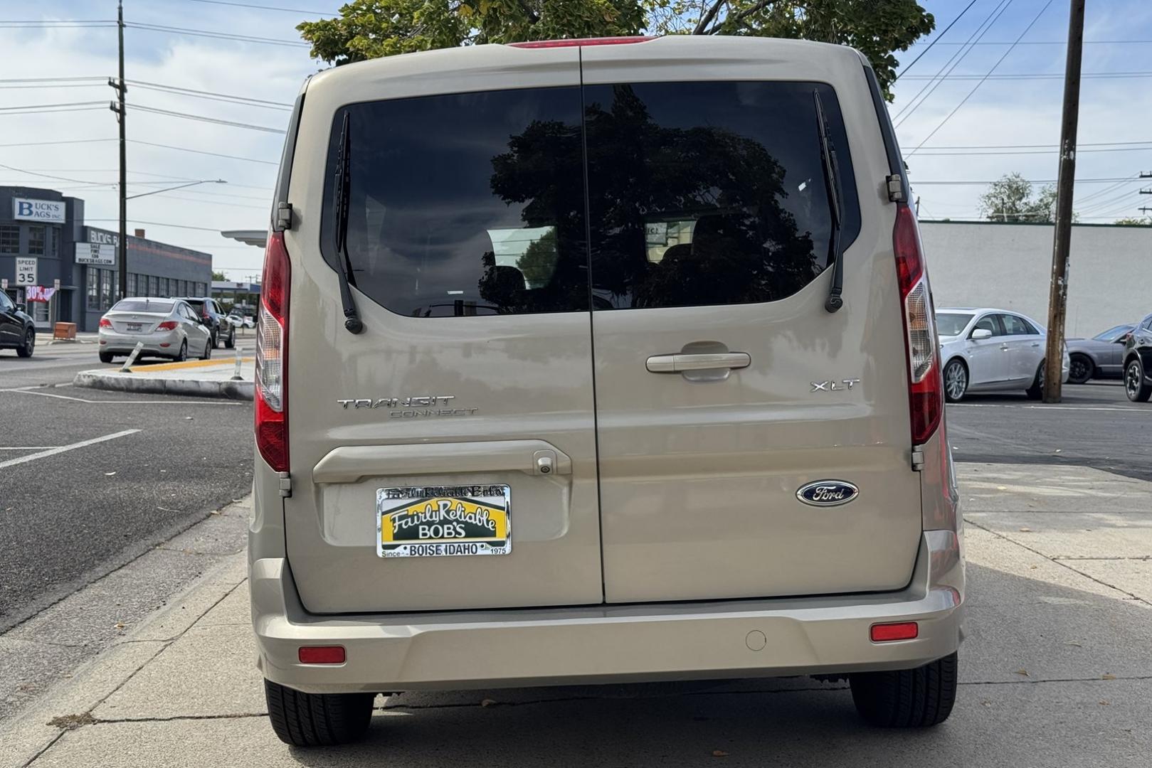2014 Tectonic Silver Metallic /Doe Skin Ford Transit Connect XLT (NM0GS9F74E1) with an 4 Cyl 2.5 Liter engine, Automatic 6 Speed transmission, located at 2304 W. Main St., Boise, ID, 83702, (208) 342-7777, 43.622105, -116.218658 - New Tires! Seats 7! - Photo#2