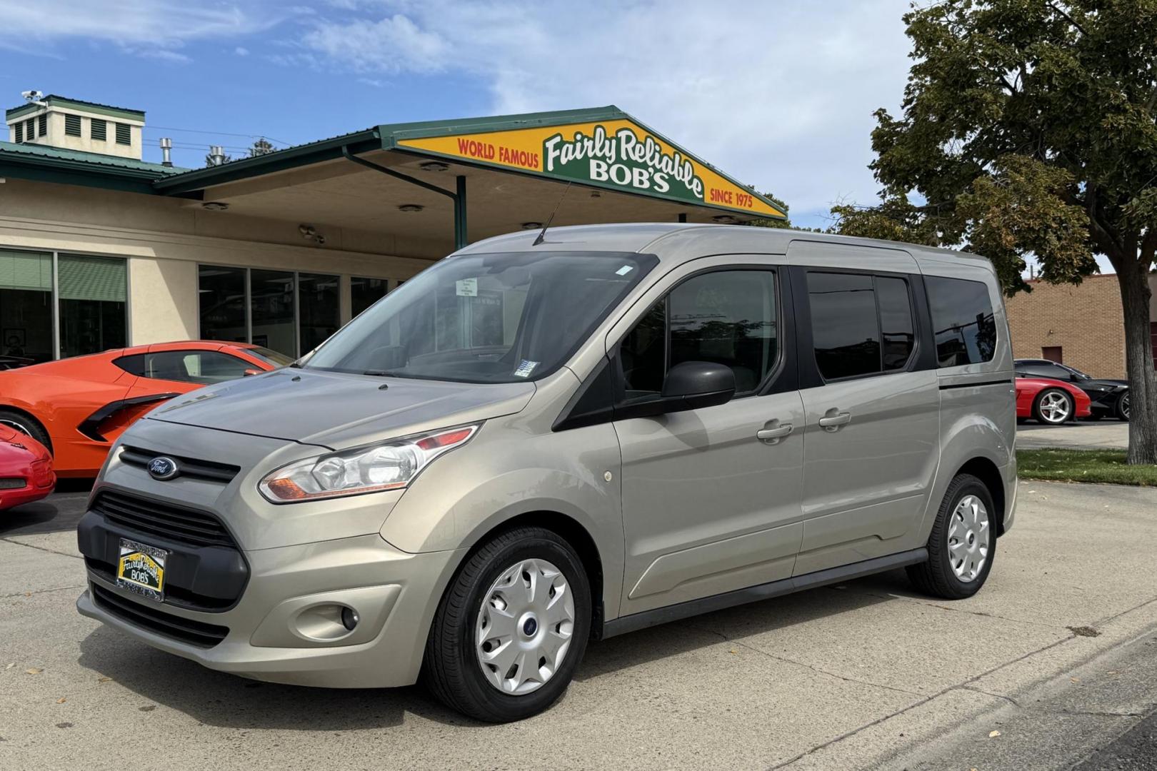 2014 Tectonic Silver Metallic /Doe Skin Ford Transit Connect XLT (NM0GS9F74E1) with an 4 Cyl 2.5 Liter engine, Automatic 6 Speed transmission, located at 2304 W. Main St., Boise, ID, 83702, (208) 342-7777, 43.622105, -116.218658 - New Tires! Seats 7! - Photo#0
