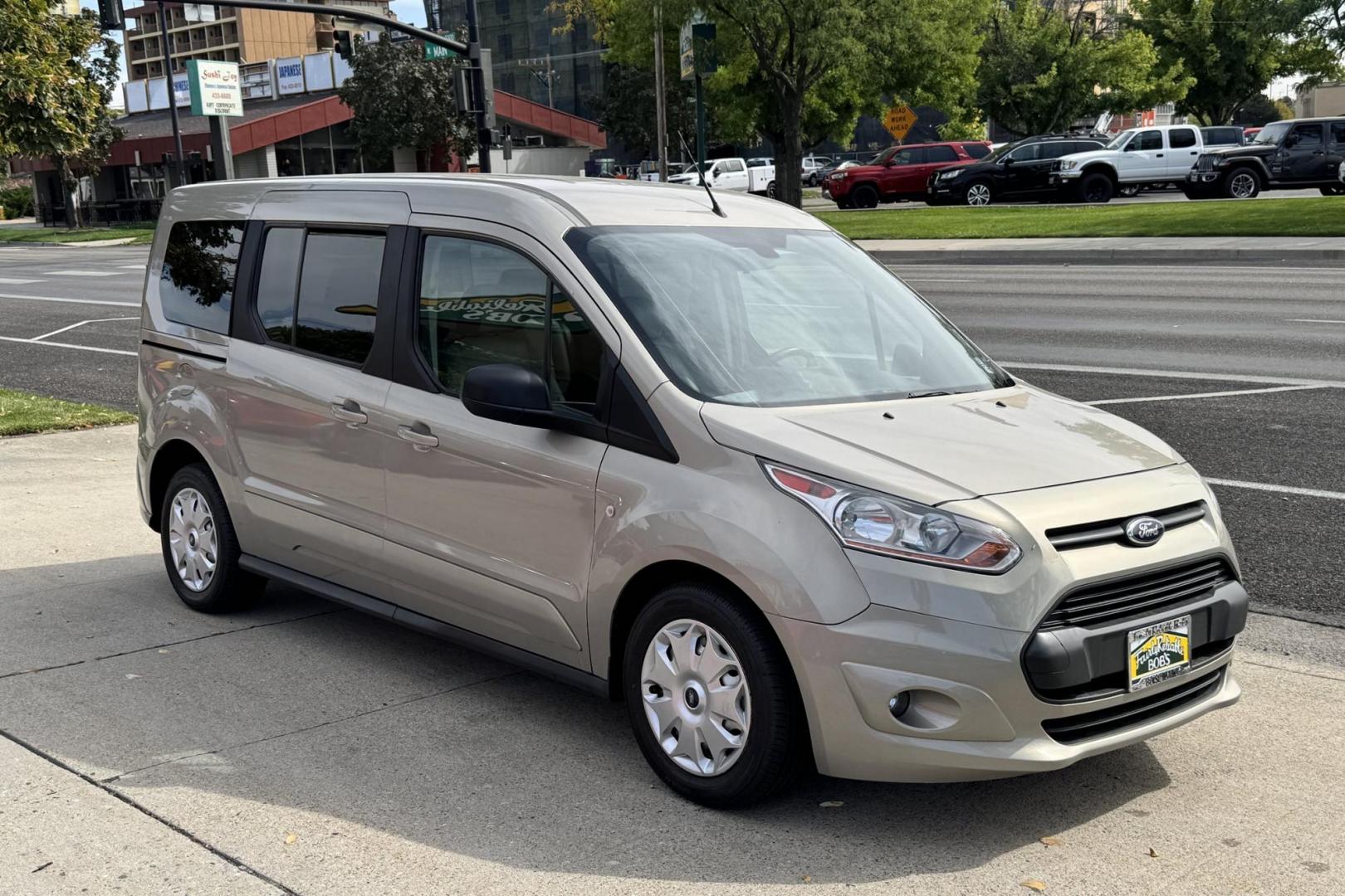 2014 Tectonic Silver Metallic /Doe Skin Ford Transit Connect XLT (NM0GS9F74E1) with an 4 Cyl 2.5 Liter engine, Automatic 6 Speed transmission, located at 2304 W. Main St., Boise, ID, 83702, (208) 342-7777, 43.622105, -116.218658 - New Tires! Seats 7! - Photo#1