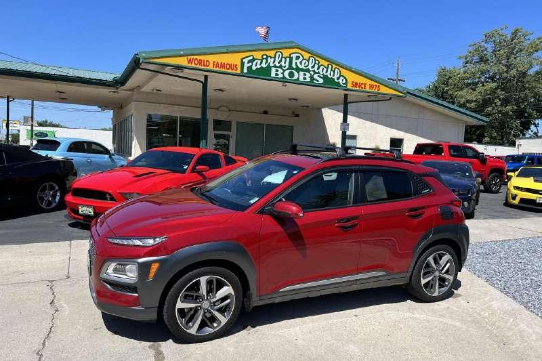 2021 Pulse Red /Gray Hyundai Kona Ultimate (KM8K5CA57MU) with an 4 Cyl 1.6 Liter Turbo engine, Automatic transmission, located at 2304 W. Main St., Boise, ID, 83702, (208) 342-7777, 43.622105, -116.218658 - Well equipped! Low miles! - Photo #0
