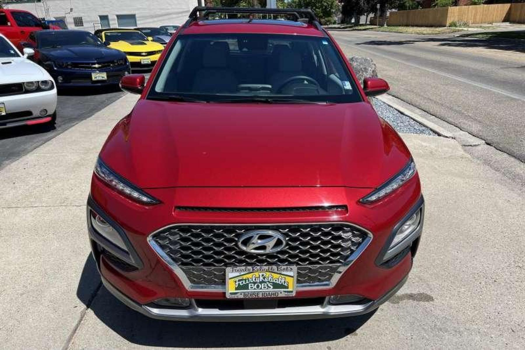 2021 Pulse Red /Gray Hyundai Kona Ultimate (KM8K5CA57MU) with an 4 Cyl 1.6 Liter Turbo engine, Automatic transmission, located at 2304 W. Main St., Boise, ID, 83702, (208) 342-7777, 43.622105, -116.218658 - Well equipped! Low miles! - Photo #1