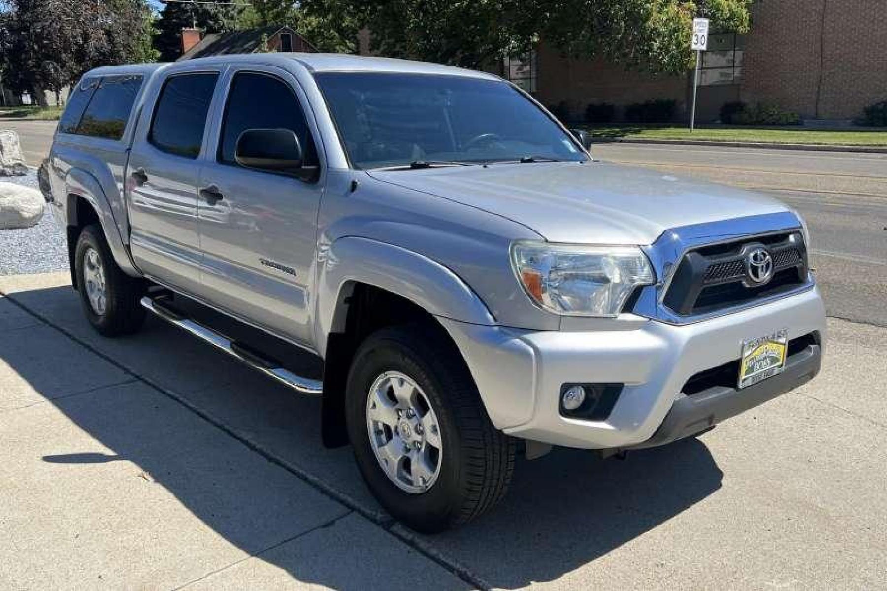 2013 Silver /Gray Toyota Tacoma Crew Cab TRD Off Road (3TMLU4ENXDM) with an V6 4.0 Liter engine, Automatic transmission, located at 2304 W. Main St., Boise, ID, 83702, (208) 342-7777, 43.622105, -116.218658 - Financing Available O.A.C. - Photo #2