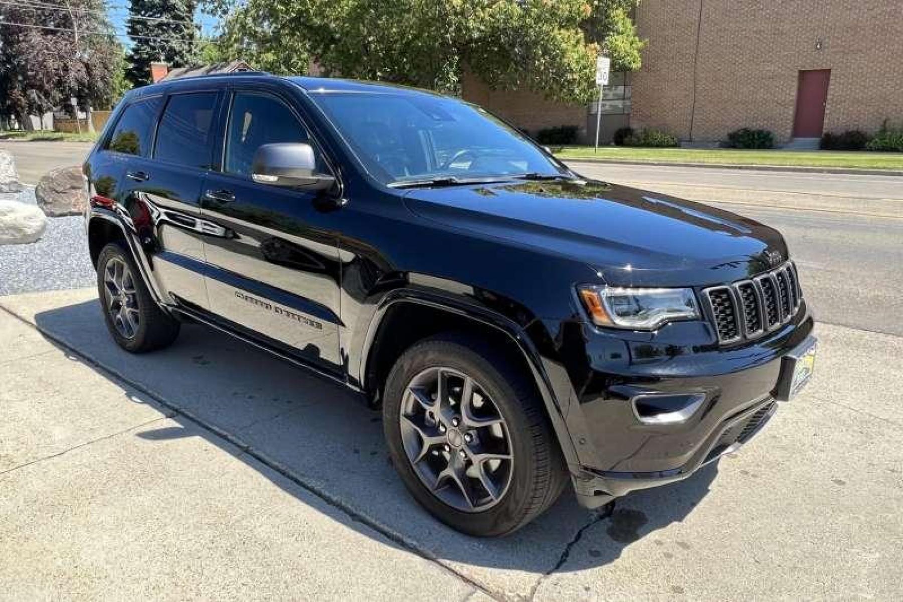 2021 Black /Black Jeep Grand Cherokee 80th Anniversary (1C4RJFBG2MC) with an V6 3.5 Liter engine, Automatic transmission, located at 2304 W. Main St., Boise, ID, 83702, (208) 342-7777, 43.622105, -116.218658 - Very well equipped! Low miles! - Photo #3