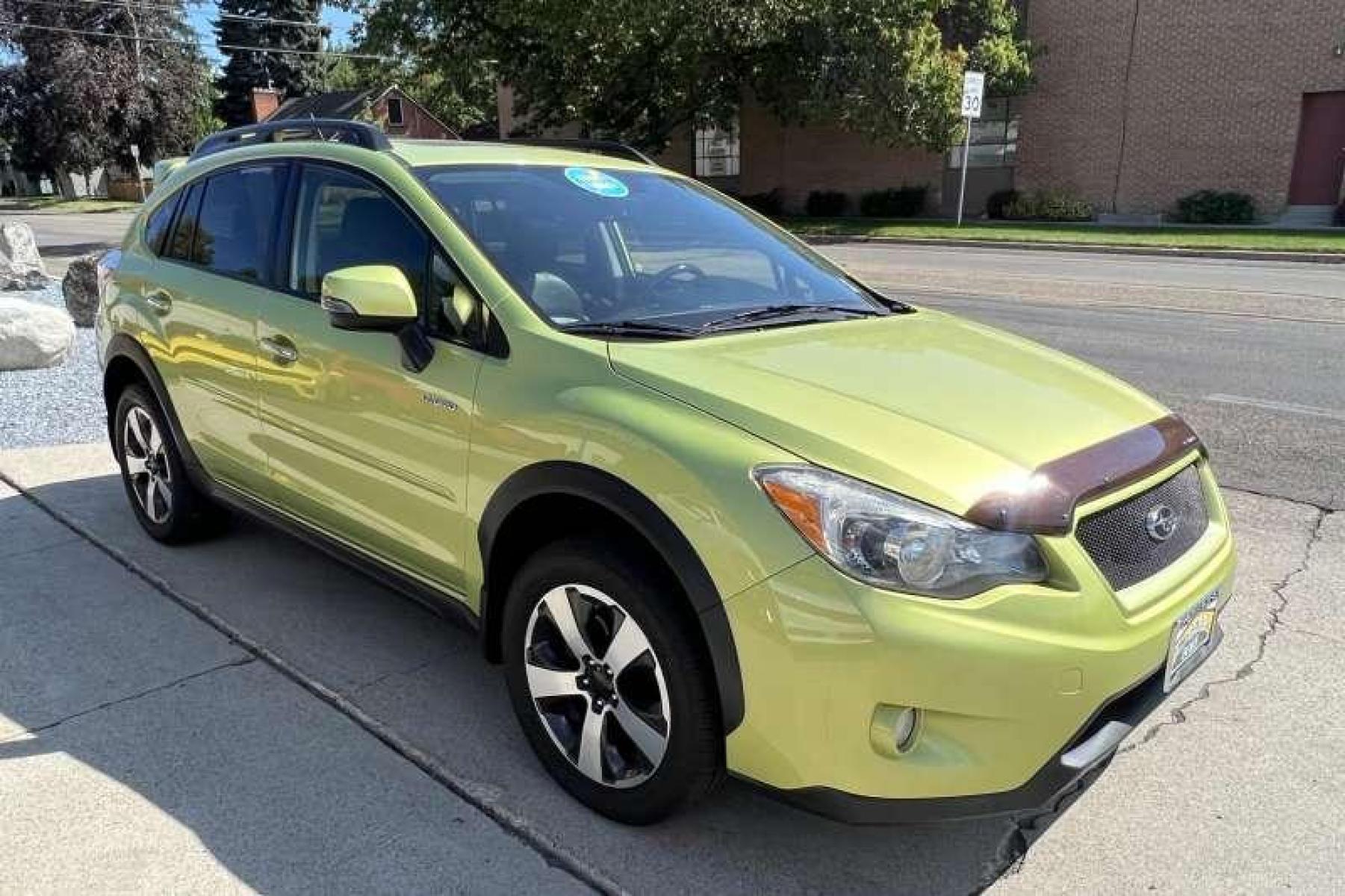 2014 Natural Green Pearl /Black Subaru Crosstrek Hybrid Touring (JF2GPBKC9EH) with an H4 2.0 Liter Hybrid engine, Automatic transmission, located at 2304 W. Main St., Boise, ID, 83702, (208) 342-7777, 43.622105, -116.218658 - Financing Available O.A.C. - Photo #2