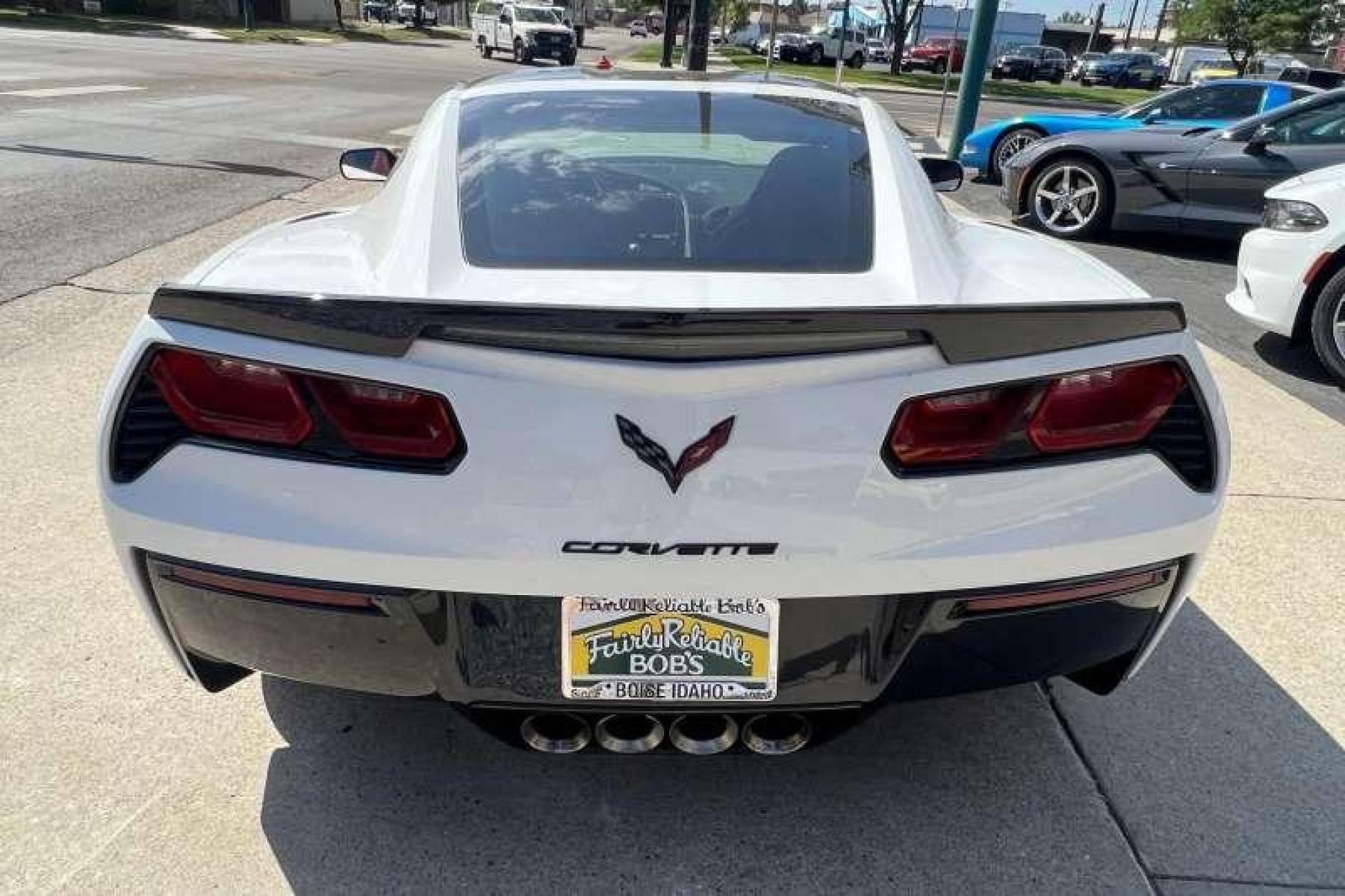 2015 Arctic White /Red Chevrolet Corvette Stingray Z51 Coupe (1G1YG2D74F5) with an V8 6.2 Liter engine, Manual transmission, located at 2304 W. Main St., Boise, ID, 83702, (208) 342-7777, 43.622105, -116.218658 - 7-Speed Manual! Low miles! - Photo #3