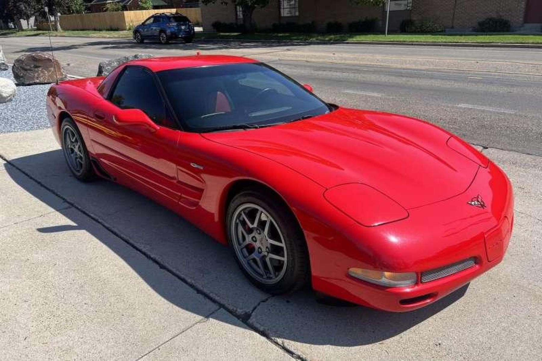 2001 Torch Red /Red/Black Chevrolet Corvette Z06 (1G1YY12S015) with an V8 5.7 Liter engine, Manual transmission, located at 2304 W. Main St., Boise, ID, 83702, (208) 342-7777, 43.622105, -116.218658 - Photo #2