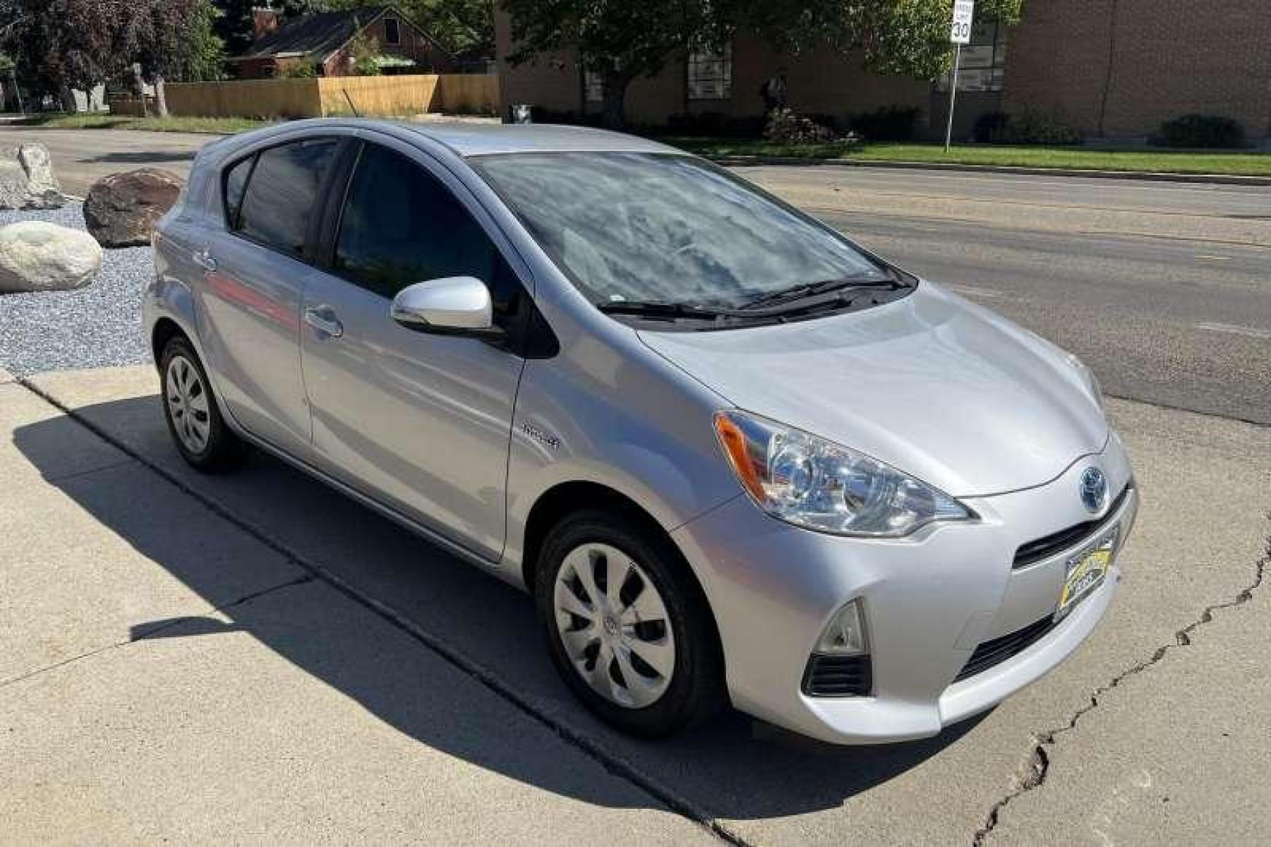 2014 Classic Silver Metallic /Gray Toyota Prius C (JTDKDTB35E1) with an 4 Cyl 1.5 Liter Hybrid engine, Automatic transmission, located at 2304 W. Main St., Boise, ID, 83702, (208) 342-7777, 43.622105, -116.218658 - Financing Available O.A.C. - Photo #2