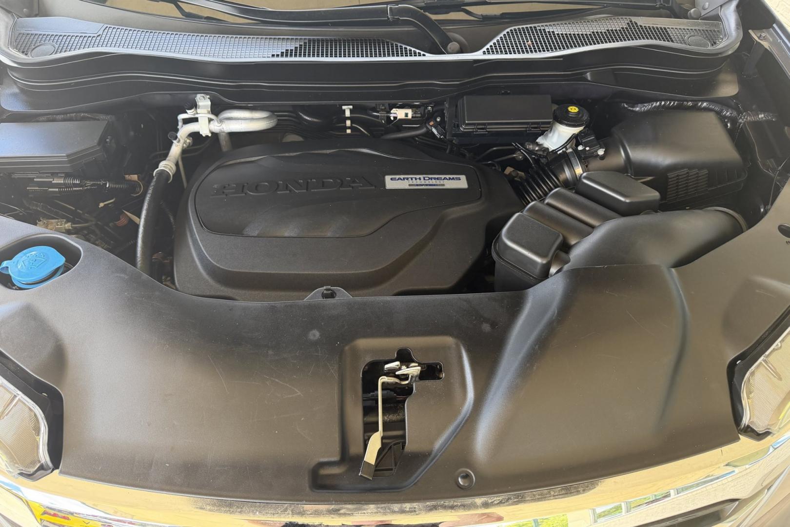 2016 Modern Steel Metallic /Gray Honda Pilot Elite (5FNYF6H04GB) with an V6 3.5 Liter engine, Automatic 9 Speed transmission, located at 2304 W. Main St., Boise, ID, 83702, (208) 342-7777, 43.622105, -116.218658 - Highly Optioned With Safety Features! Heated and Ventilated Seats! Blu Ray Entertainment!- Photo#19