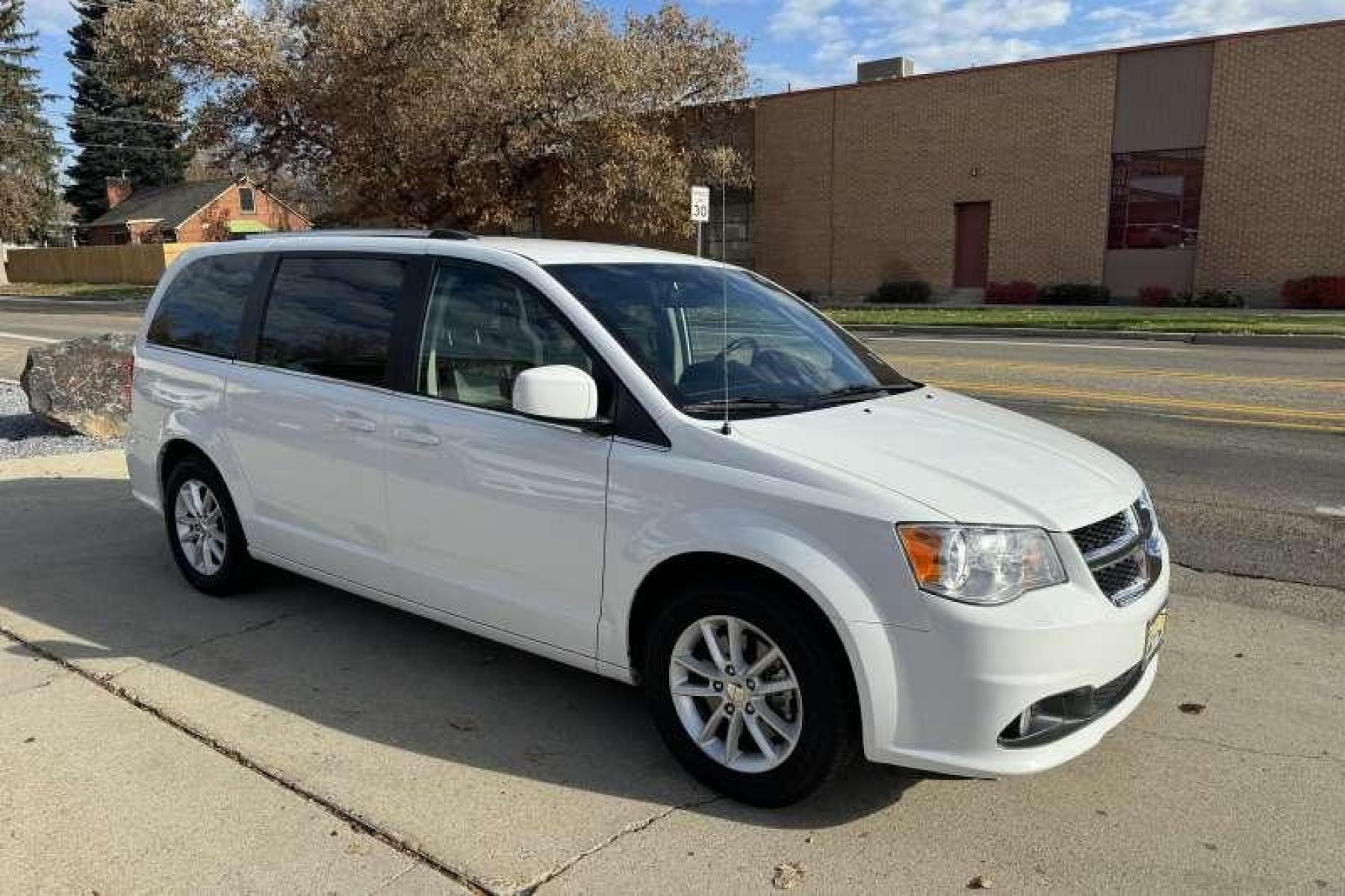 2019 Bright White /Black Dodge Grand Caravan SXT (2C4RDGCG2KR) with an V6 3.6 Liter engine, Automatic transmission, located at 2304 W. Main St., Boise, ID, 83702, (208) 342-7777, 43.622105, -116.218658 - Photo #2