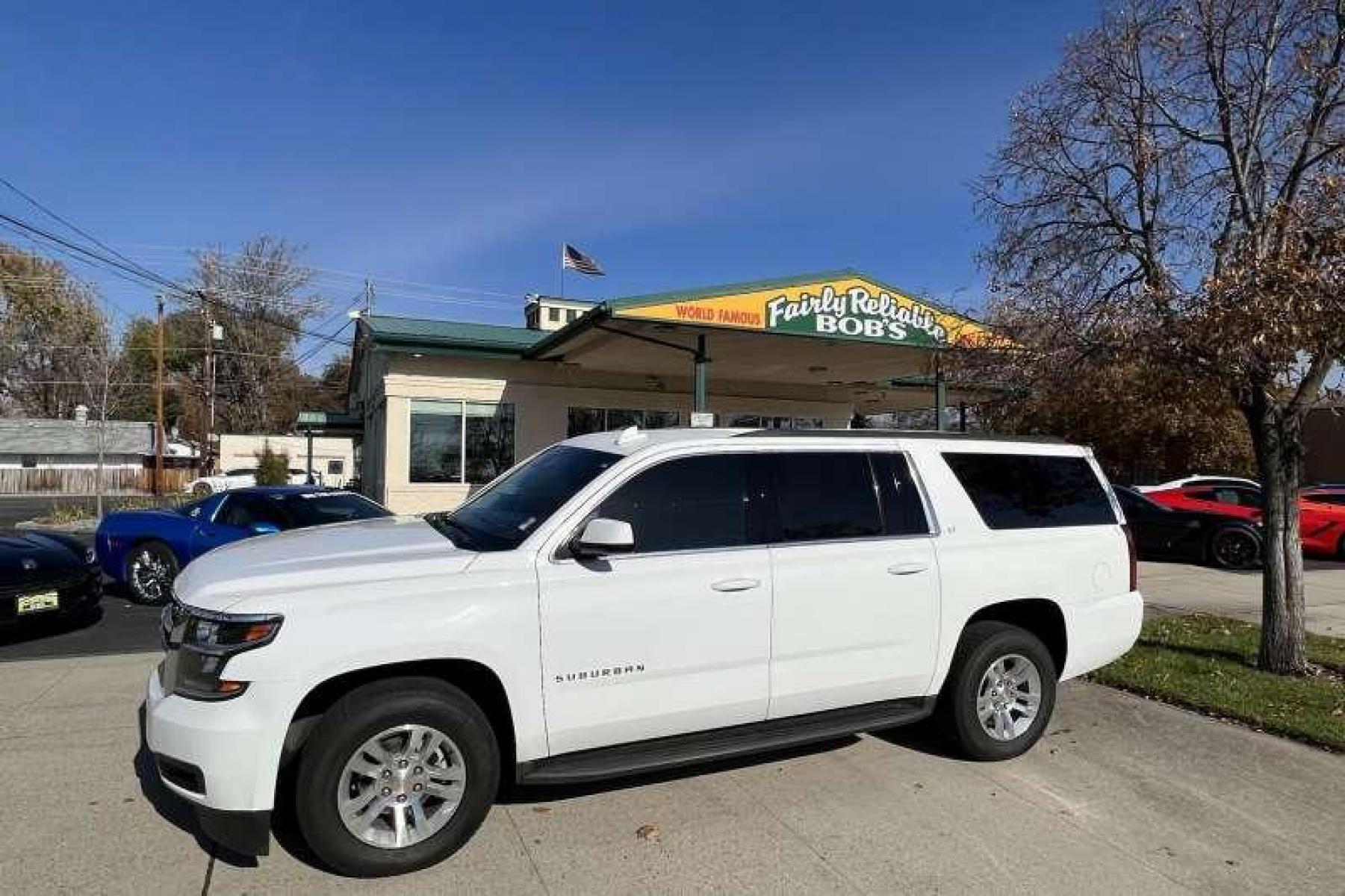 2016 White /Black Chevrolet Suburban LT (1GNSKHKC7GR) with an V8 5.3 Liter engine, Automatic transmission, located at 2304 W. Main St., Boise, ID, 83702, (208) 342-7777, 43.622105, -116.218658 - Financing Available O.A.C. - Photo #0