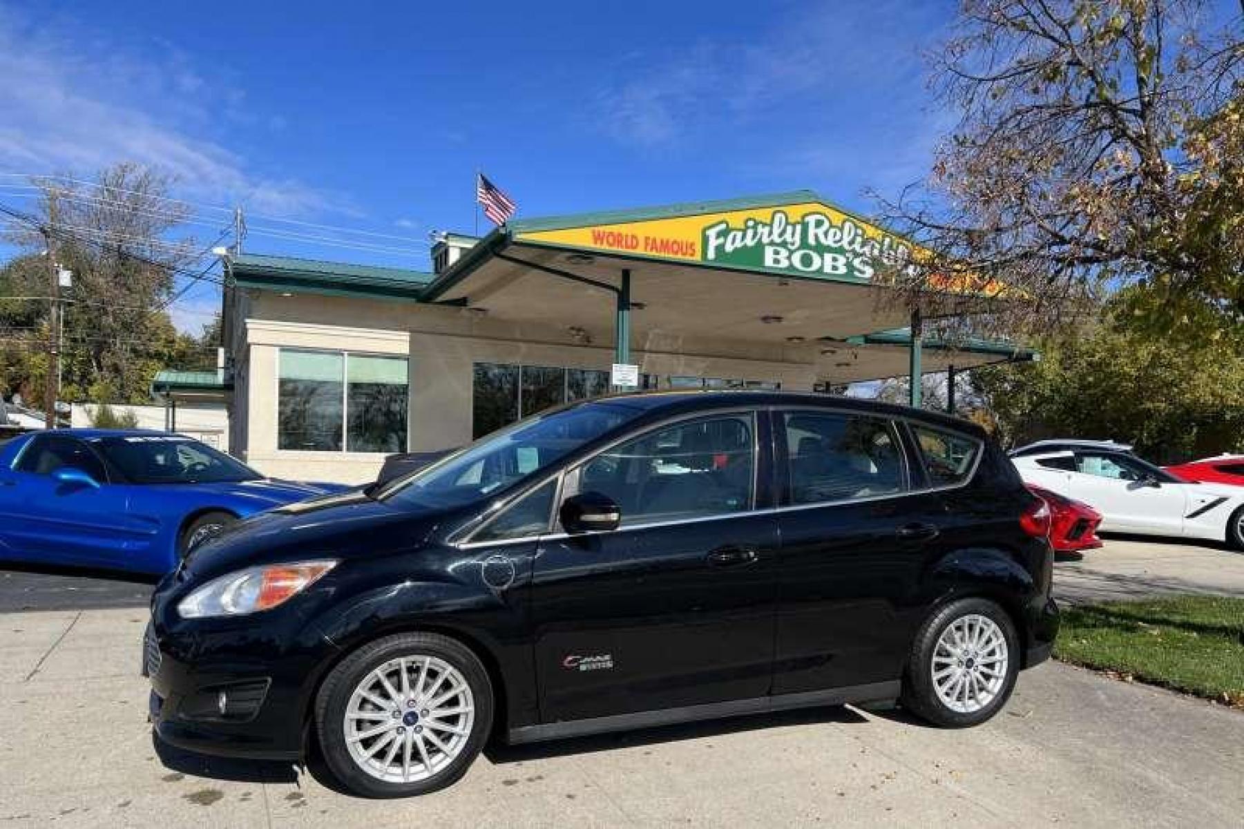 2016 Black /Tan Ford C-Max Energi Hatchback SEL (1FADP5CU9GL) with an 4 Cyl 2.0 Liter Hybrid engine, Automatic transmission, located at 2304 W. Main St., Boise, ID, 83702, (208) 342-7777, 43.622105, -116.218658 - Photo #0