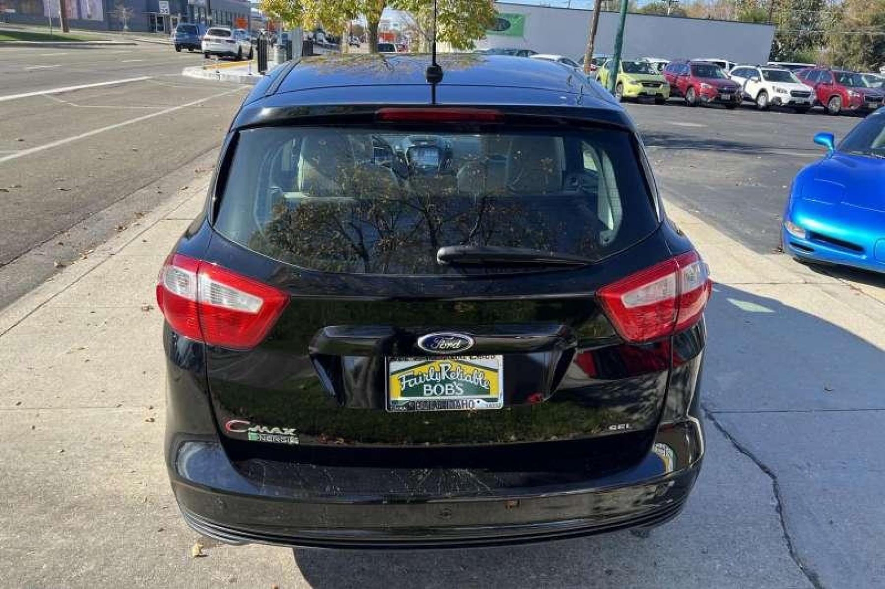 2016 Black /Tan Ford C-Max Energi Hatchback SEL (1FADP5CU9GL) with an 4 Cyl 2.0 Liter Hybrid engine, Automatic transmission, located at 2304 W. Main St., Boise, ID, 83702, (208) 342-7777, 43.622105, -116.218658 - Recharging on the run lets the C-Max Energi's power management system regularly deliver short bursts of all-electric travel, which can stretch overall fuel economy to nearly 90 MPGe. Operating only in standard hybrid mode when the initial battery charge is depleted, the C-Max Energi delivers up to 3 - Photo #3