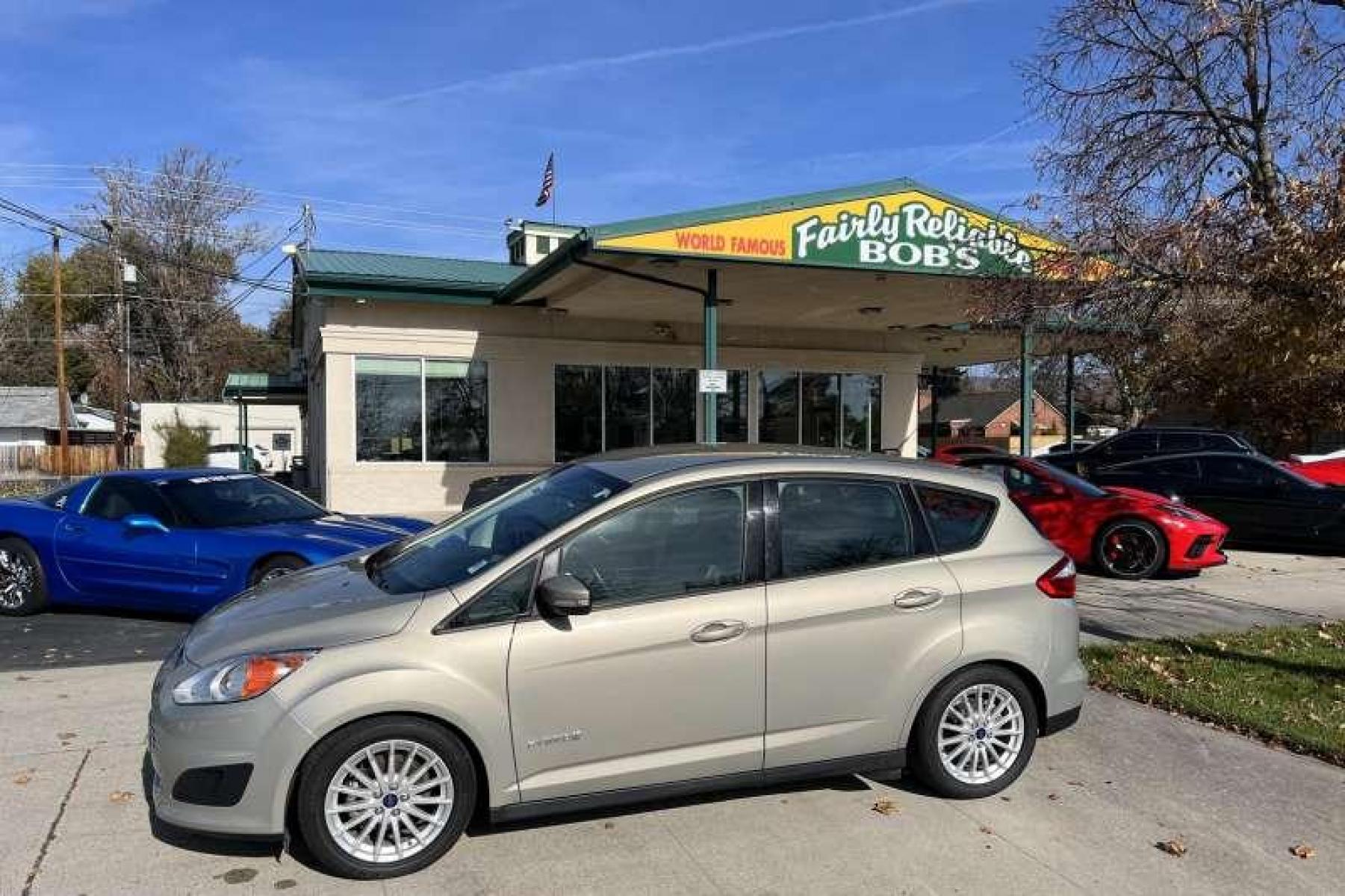 2015 Tectonic Silver /Tan Ford C-Max Hybrid SE Hatchback (1FADP5AUXFL) with an 4 Cyl 2.0 Liter Hybrid engine, Automatic transmission, located at 2304 W. Main St., Boise, ID, 83702, (208) 342-7777, 43.622105, -116.218658 - New Tires! Low Mileage and over 36 MPG! - Photo #0