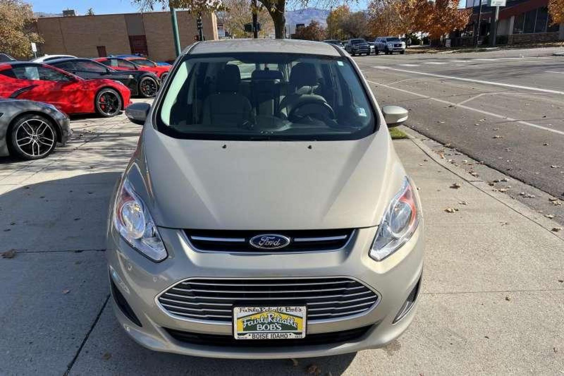 2015 Tectonic Silver /Tan Ford C-Max Hybrid SE Hatchback (1FADP5AUXFL) with an 4 Cyl 2.0 Liter Hybrid engine, Automatic transmission, located at 2304 W. Main St., Boise, ID, 83702, (208) 342-7777, 43.622105, -116.218658 - Photo #1