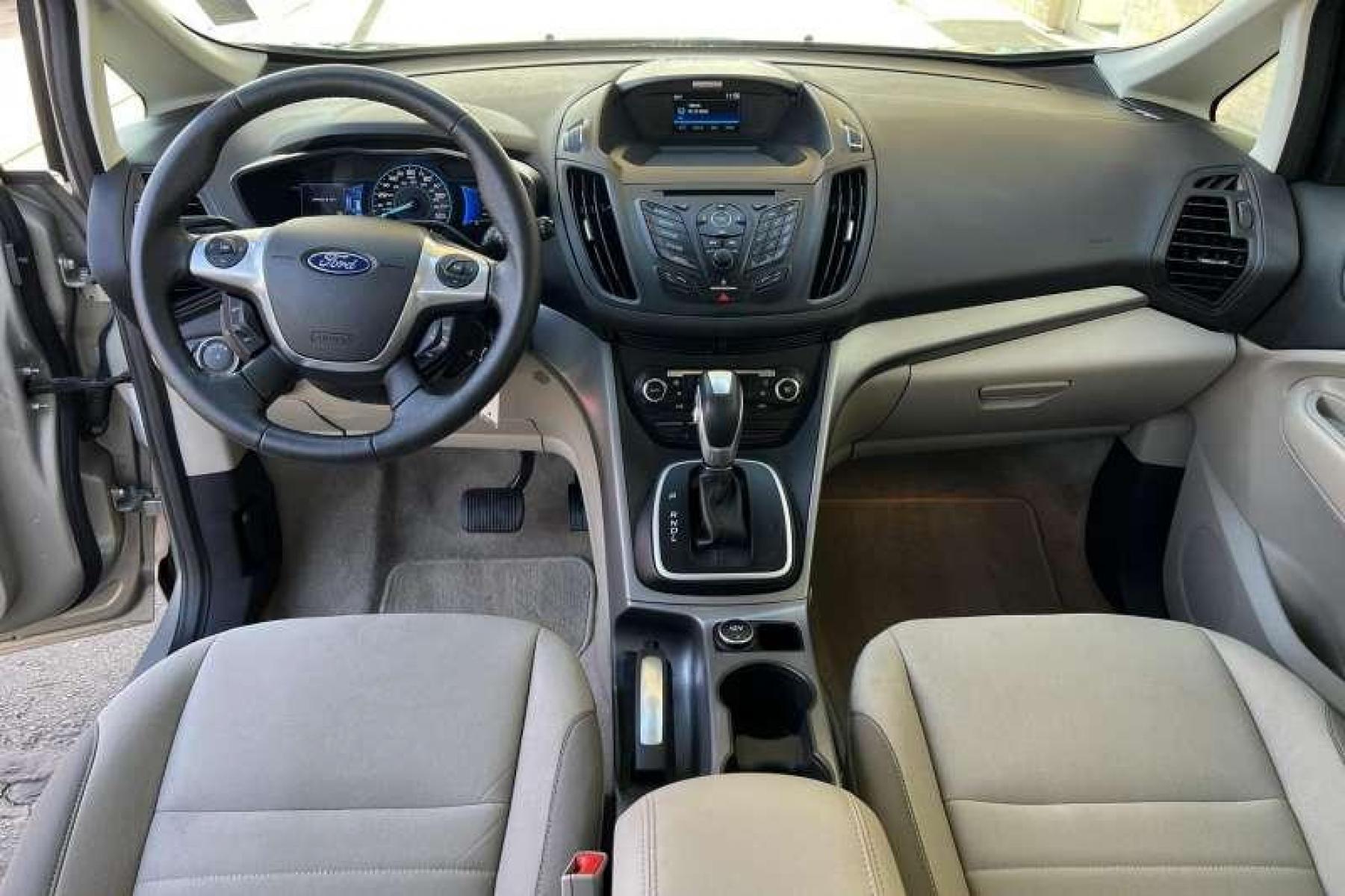 2015 Tectonic Silver /Tan Ford C-Max Hybrid SE Hatchback (1FADP5AUXFL) with an 4 Cyl 2.0 Liter Hybrid engine, Automatic transmission, located at 2304 W. Main St., Boise, ID, 83702, (208) 342-7777, 43.622105, -116.218658 - New Tires! Low Mileage and over 36 MPG! - Photo #7