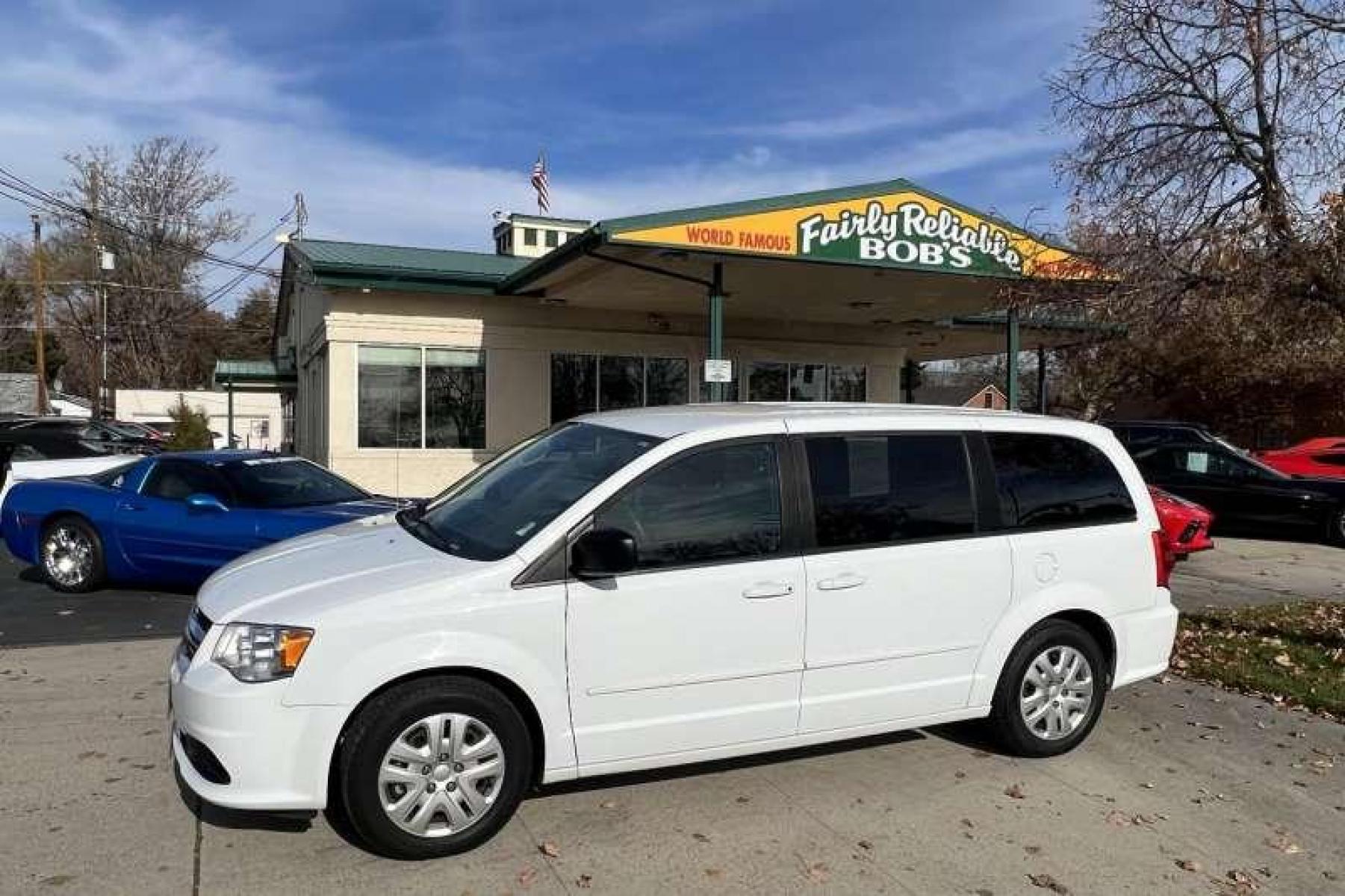 2016 Bright White /Black Dodge Grand Caravan SE (2C4RDGBG0GR) with an V6 3.6 Liter engine, Automatic transmission, located at 2304 W. Main St., Boise, ID, 83702, (208) 342-7777, 43.622105, -116.218658 - Financing Available O.A.C. - Photo #0