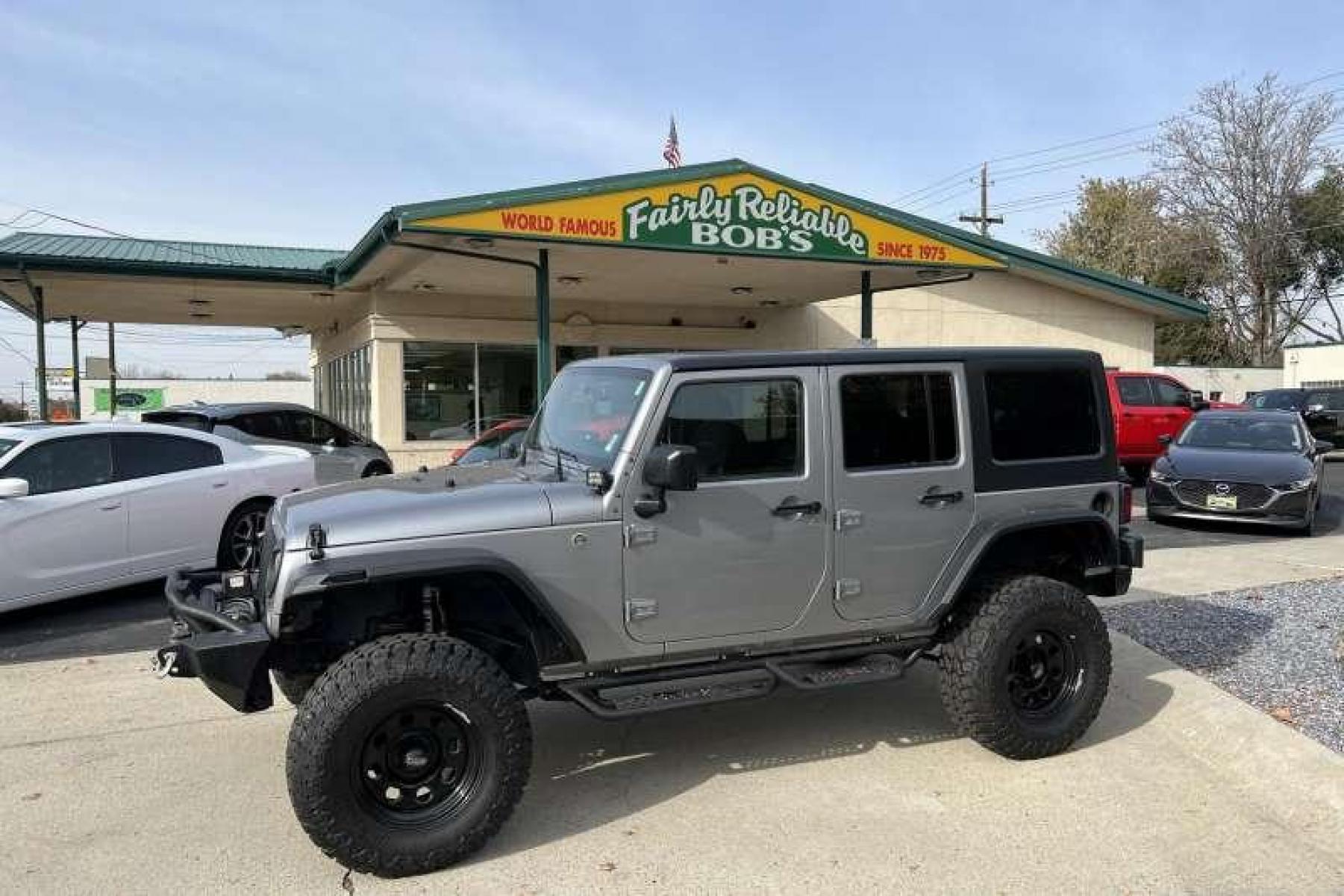 2016 Billet Silver /Black Jeep Wrangler Unlimited Sahara (1C4BJWEG4GL) with an V6 3.6 Liter engine, Automatic transmission, located at 2304 W. Main St., Boise, ID, 83702, (208) 342-7777, 43.622105, -116.218658 - Financing Available O.A.C. - Photo #0