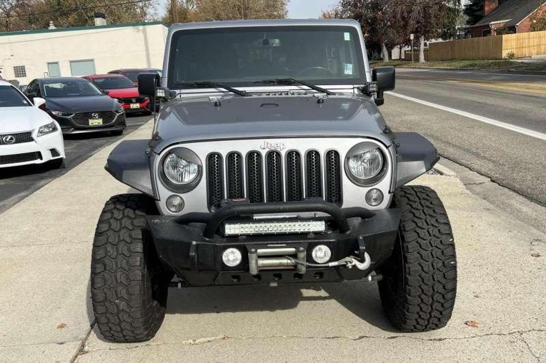 2016 Billet Silver /Black Jeep Wrangler Unlimited Sahara (1C4BJWEG4GL) with an V6 3.6 Liter engine, Automatic transmission, located at 2304 W. Main St., Boise, ID, 83702, (208) 342-7777, 43.622105, -116.218658 - Financing Available O.A.C. - Photo #1