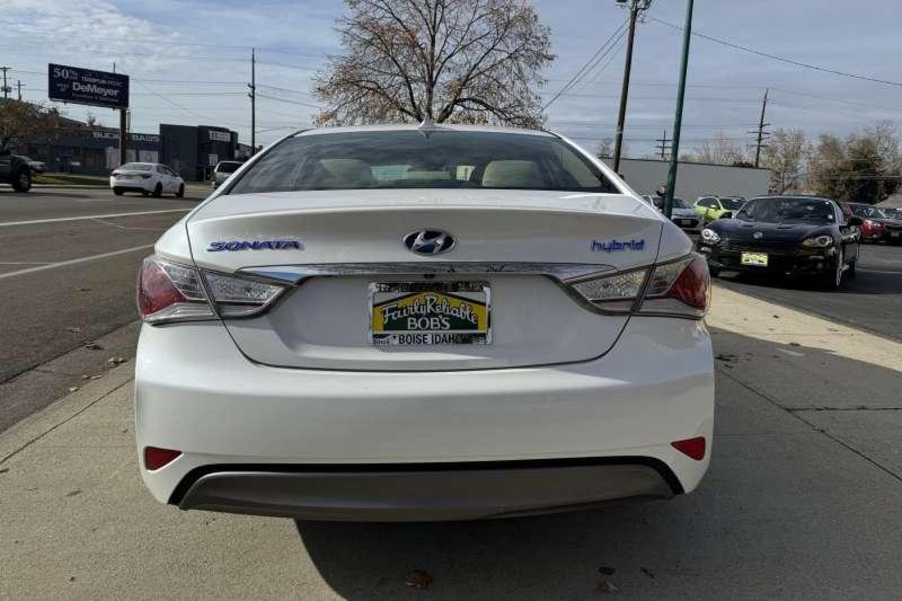 2015 Quartz White Pearl Hyundai Sonata Hybrid (KMHEC4A49FA) with an 4 Cyl 2.4 Liter Hybrid engine, Automatic transmission, located at 2304 W. Main St., Boise, ID, 83702, (208) 342-7777, 43.622105, -116.218658 - New Tires! 35 MPG City and 38 Highway! Smooth Ride Too! - Photo #1