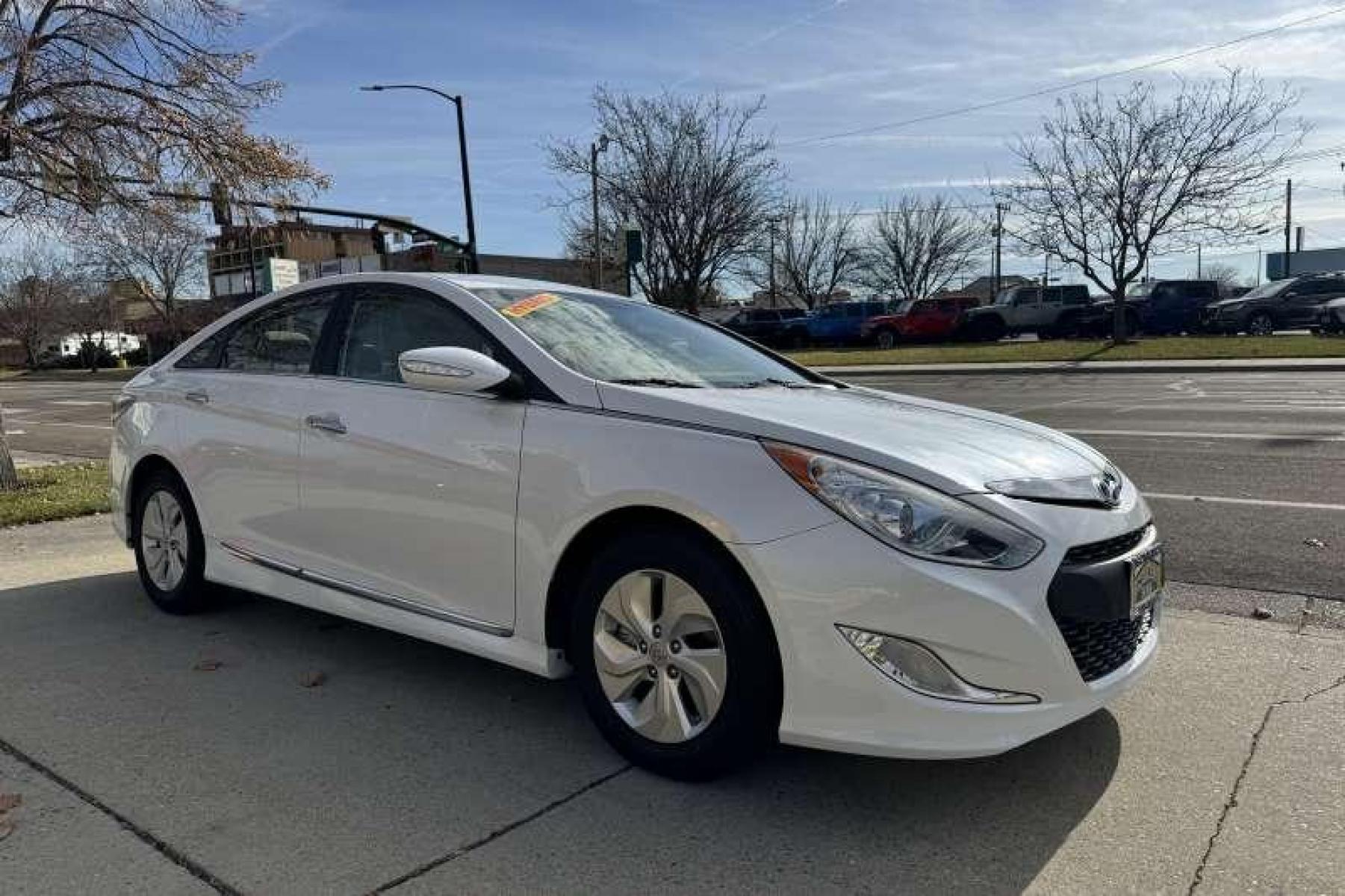 2015 Quartz White Pearl Hyundai Sonata Hybrid (KMHEC4A49FA) with an 4 Cyl 2.4 Liter Hybrid engine, Automatic transmission, located at 2304 W. Main St., Boise, ID, 83702, (208) 342-7777, 43.622105, -116.218658 - New Tires! 35 MPG City and 38 Highway! Smooth Ride Too! - Photo #2