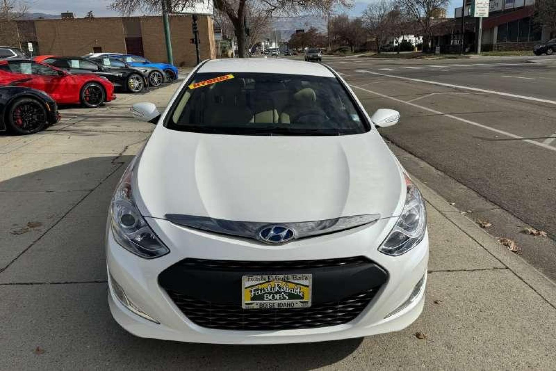 2015 Quartz White Pearl Hyundai Sonata Hybrid (KMHEC4A49FA) with an 4 Cyl 2.4 Liter Hybrid engine, Automatic transmission, located at 2304 W. Main St., Boise, ID, 83702, (208) 342-7777, 43.622105, -116.218658 - New Tires! 35 MPG City and 38 Highway! Smooth Ride Too! - Photo #3