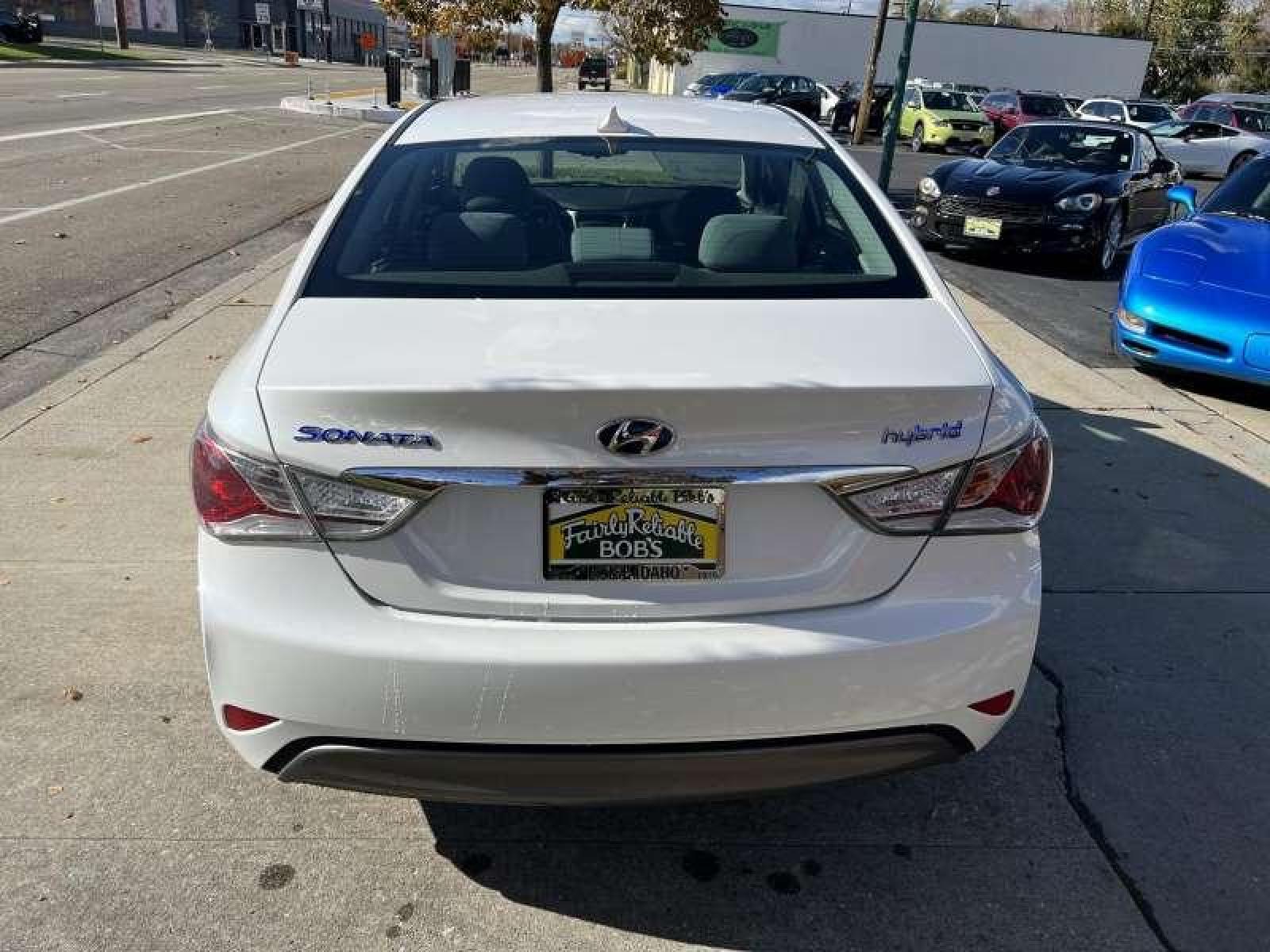 2014 White /Gray Hyundai Sonata Hybrid (KMHEC4A45EA) with an 4 Cyl 2.4 Liter Hybrid engine, Automatic transmission, located at 2304 W. Main St., Boise, ID, 83702, (208) 342-7777, 43.622105, -116.218658 - Financing Available O.A.C. - Photo #3