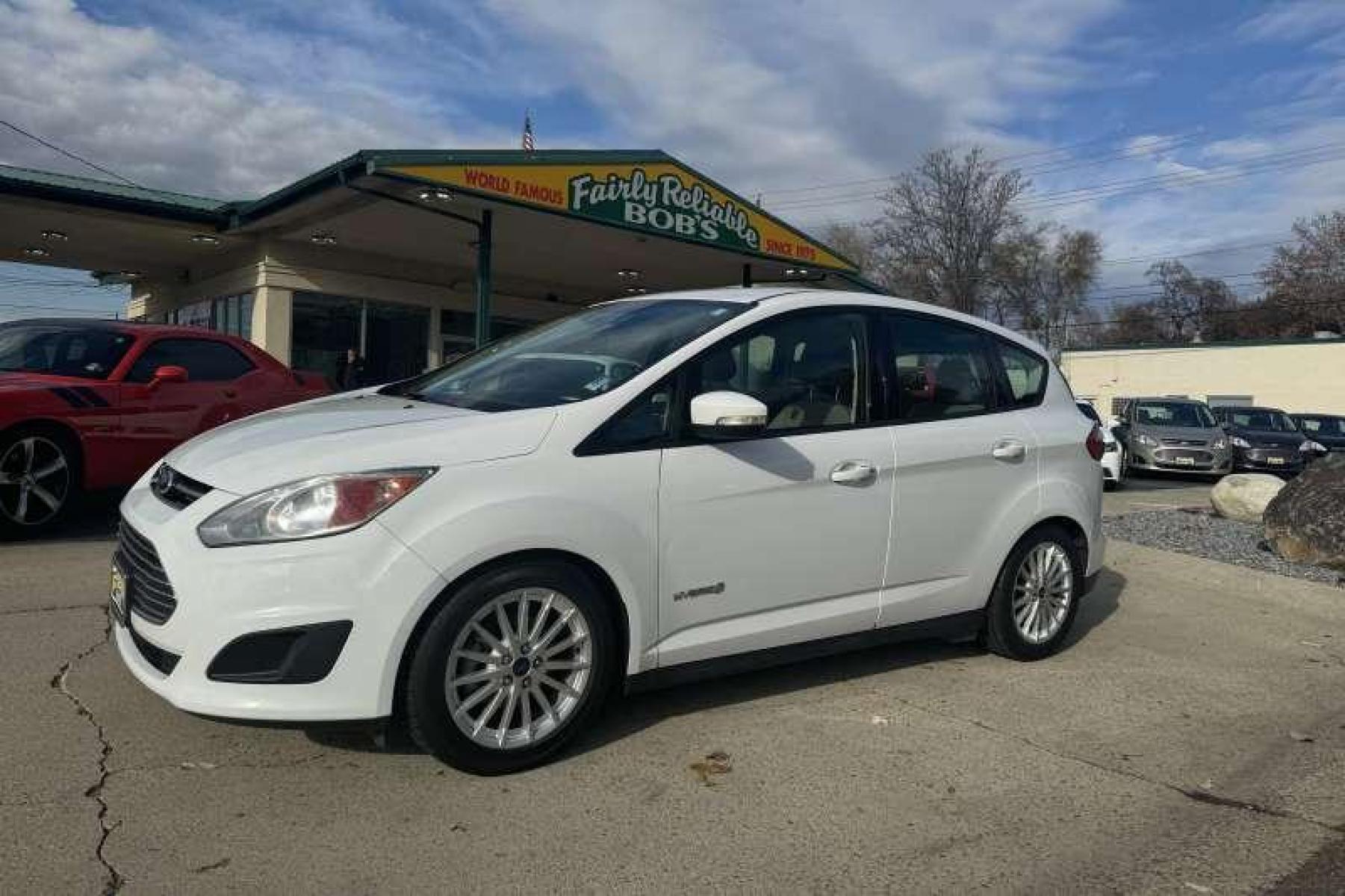 2014 Oxford White /Stone Ford C-Max Hybrid SE Hatchback (1FADP5AU8EL) with an 4 Cyl 2.0 Liter Hybrid engine, Automatic transmission, located at 2304 W. Main St., Boise, ID, 83702, (208) 342-7777, 43.622105, -116.218658 - Low Mileage and 36 MPG Highway and Over 40 City! Financing Available O.A.C. - Photo #0